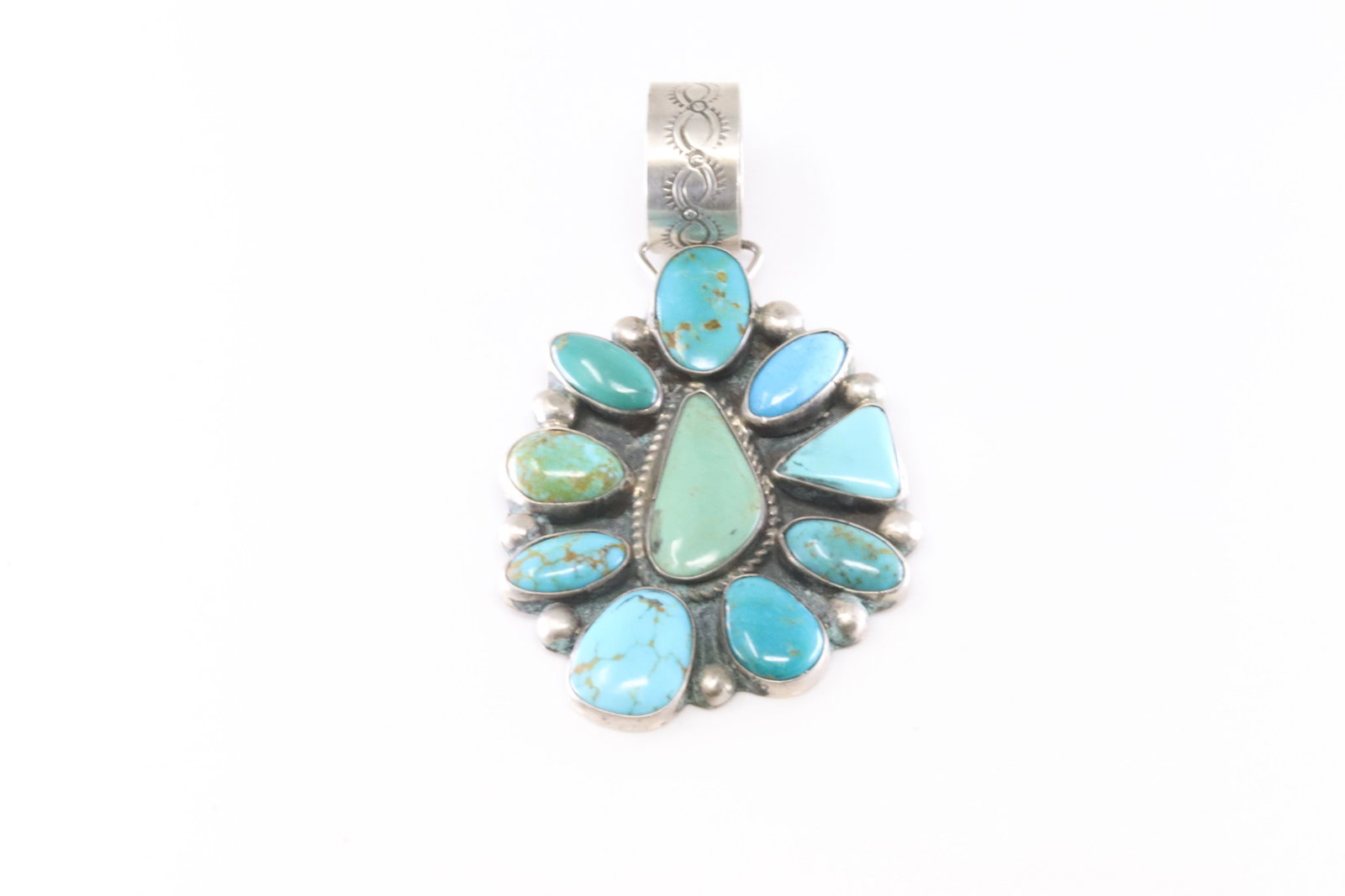 Native America Navajo Sterling Silver Kingman Turquoise Pendant By Geraldine James.: This is a Native America Navajo Sterling Silver Kingman Turquoise Pendant By Geraldine James.
