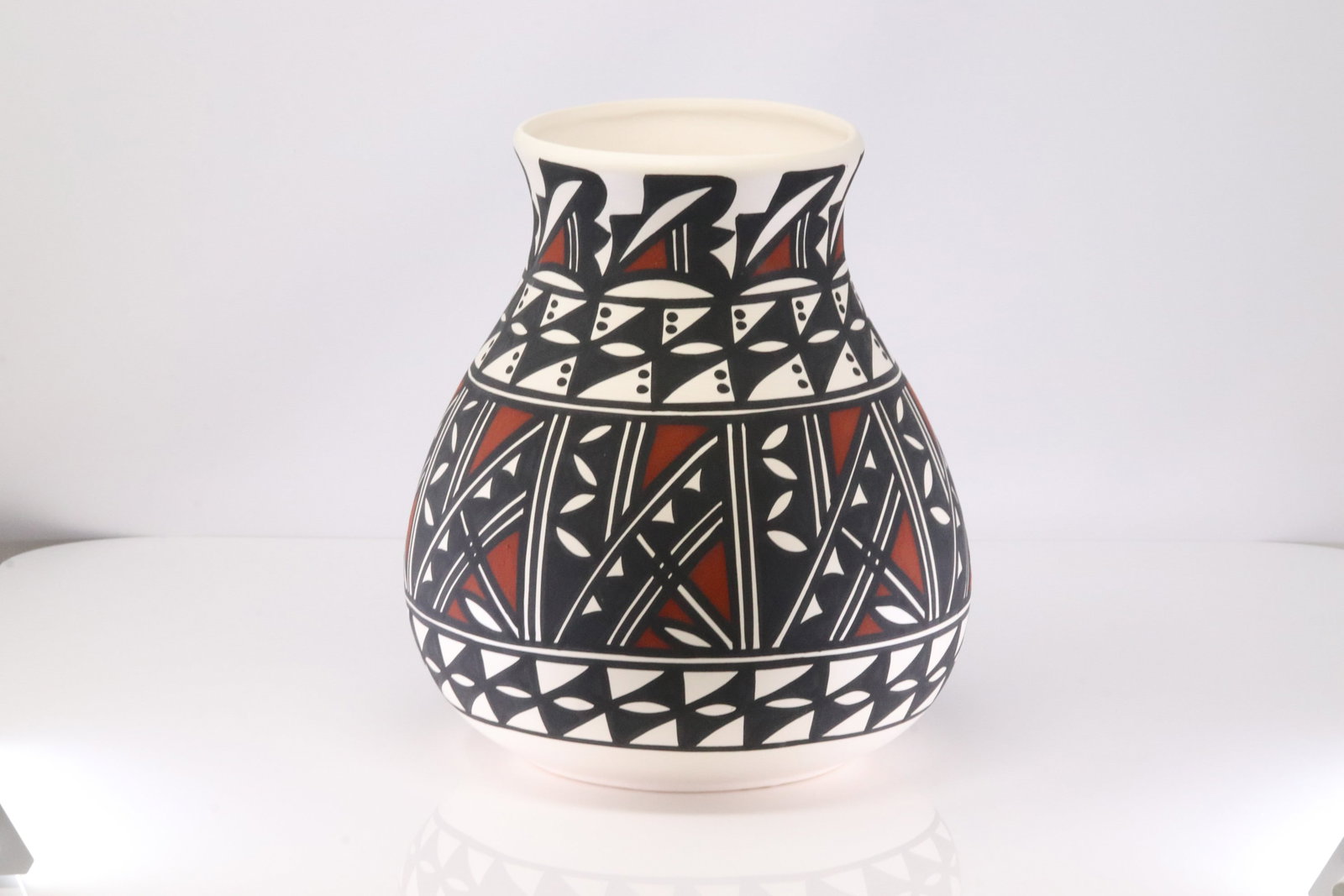 Signed L. Aragon Acoma Pueblo Pottery Vase Native American Fine Line Geometric Black White Red: Beautiful handcrafted Native American pottery vase by L. Aragon of Acoma Pueblo, New Mexico. 16.00"This piece features classic Acoma fine-line geometric designs, executed with precision in black over 