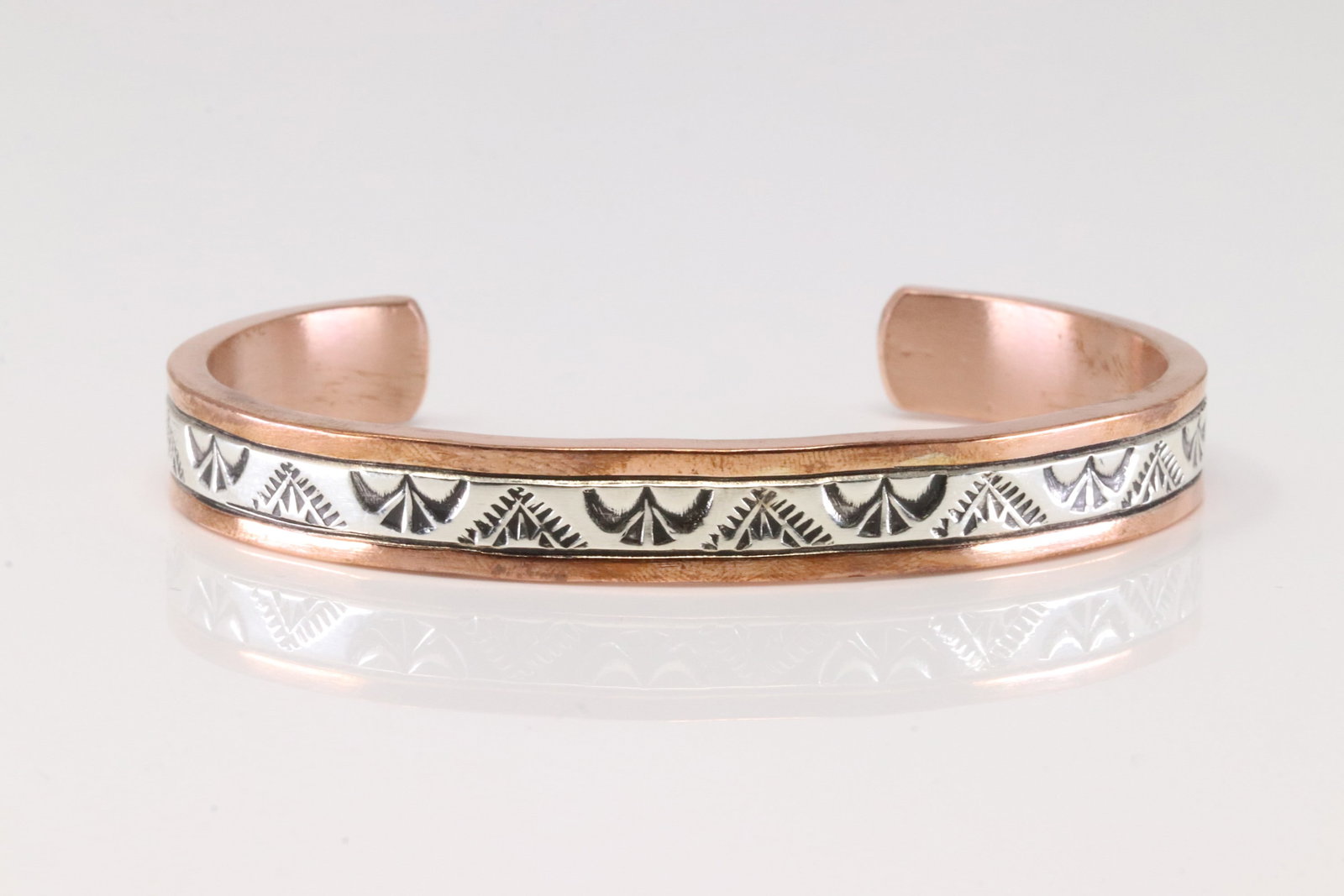 Native American Navajo Sterling Silver Copper Bracelet Cuff By Wylie Secatero.: This is a Native American Navajo Sterling Silver Copper Bracelet Cuff By Wylie Secatero.