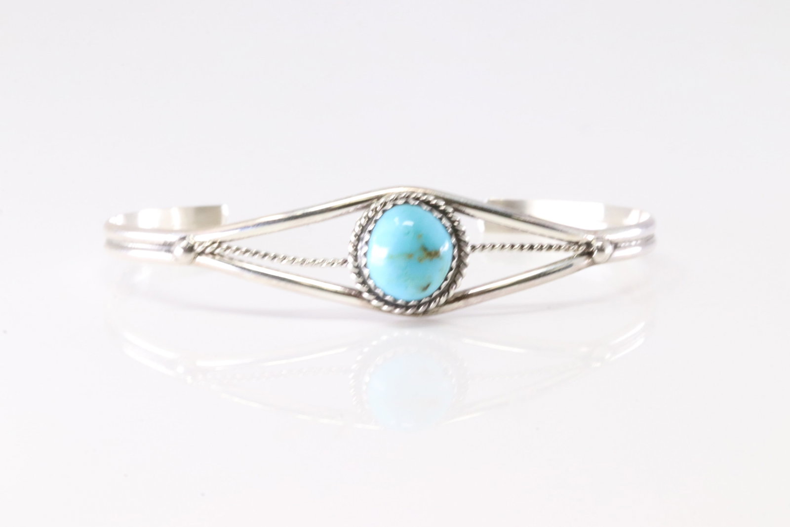 Native America Navajo Sterling Silver Turquoise Bracelet Cuff By Esther White.: This is a Native America Navajo Sterling Silver Turquoise Bracelet Cuff By Esther White. Stamp E.W.