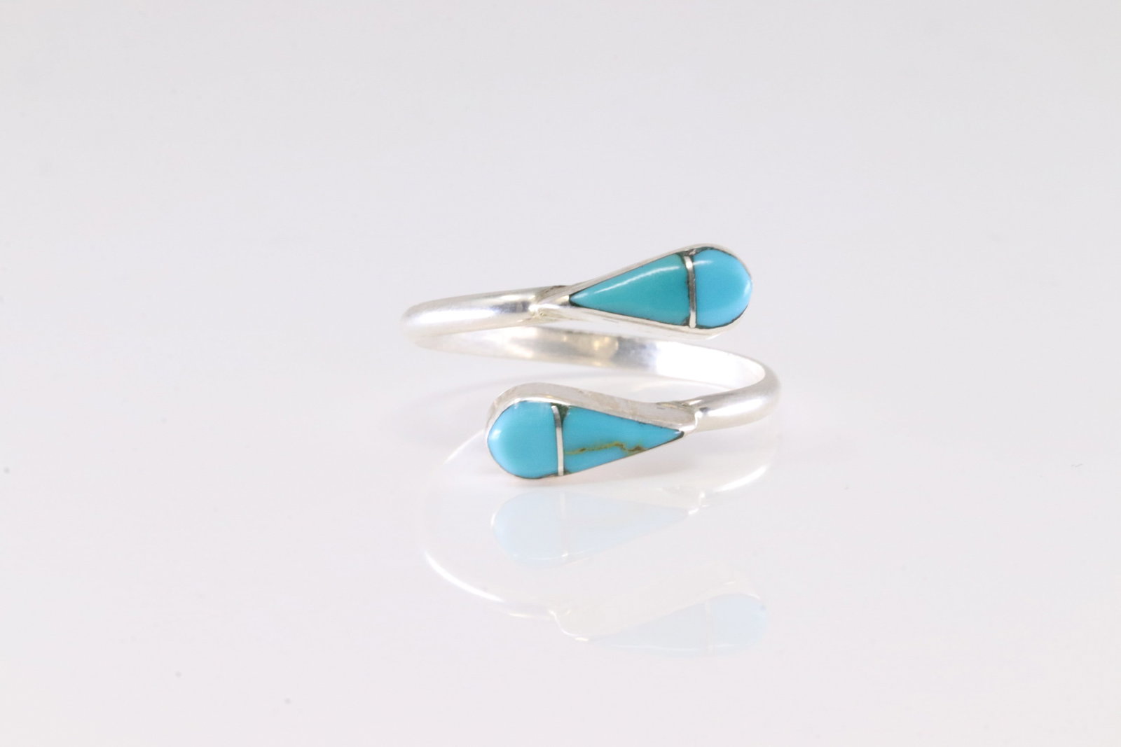 Native America Zuni Sterling Silver Turquoise Inlay Ring By R.V.N. Ring size: 8.00.: This is a Native America Zuni Sterling Silver Turquoise Inlay Ring By R.V.N. Ring size: 8.00.
