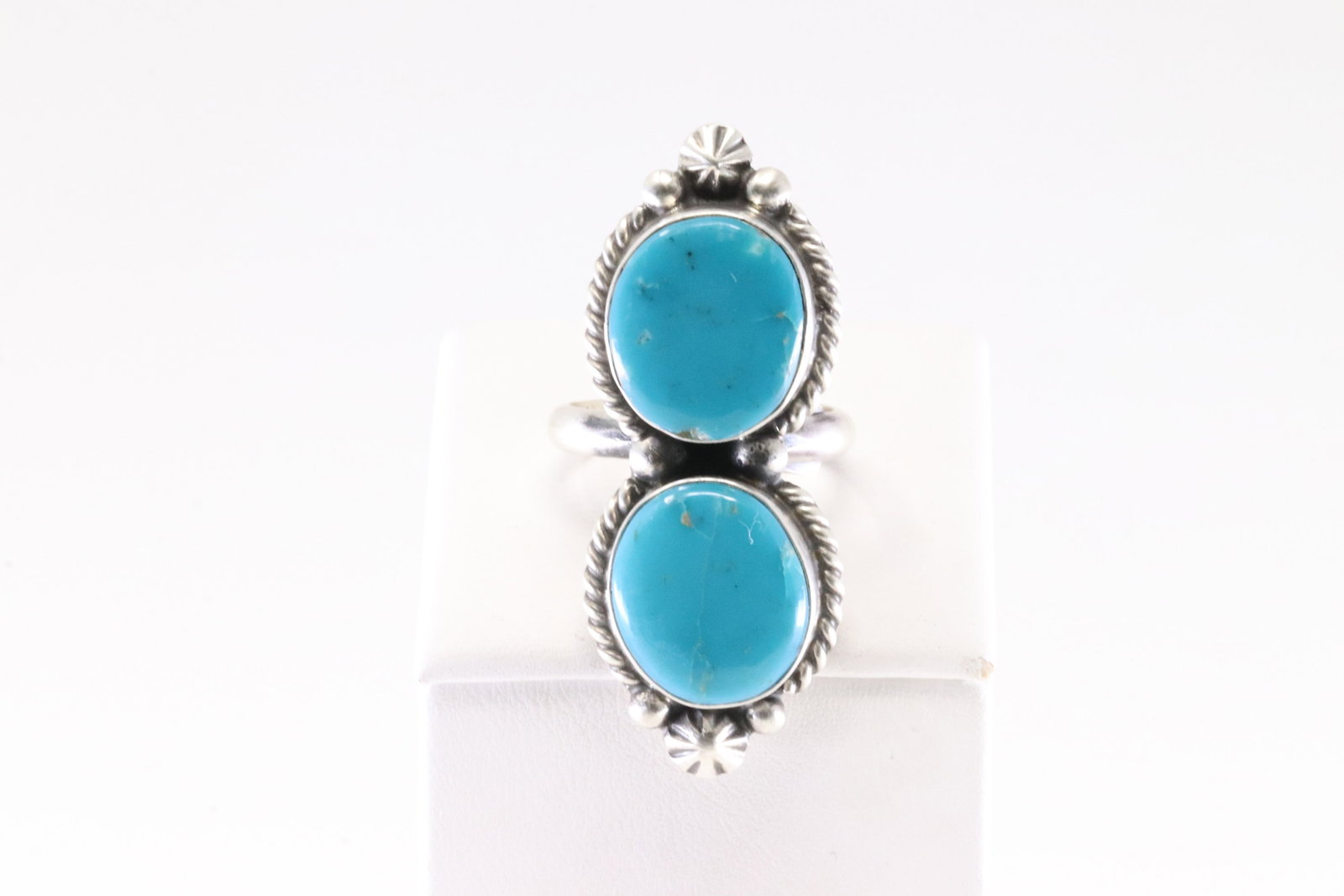Native America Navajo Sterling Silver Turquoise Ring 2 Stone By Eugene Belone.: This is a Native America Navajo Sterling Silver Turquoise Ring 2 Stone By Eugene Belone. Ring size: 7.50.