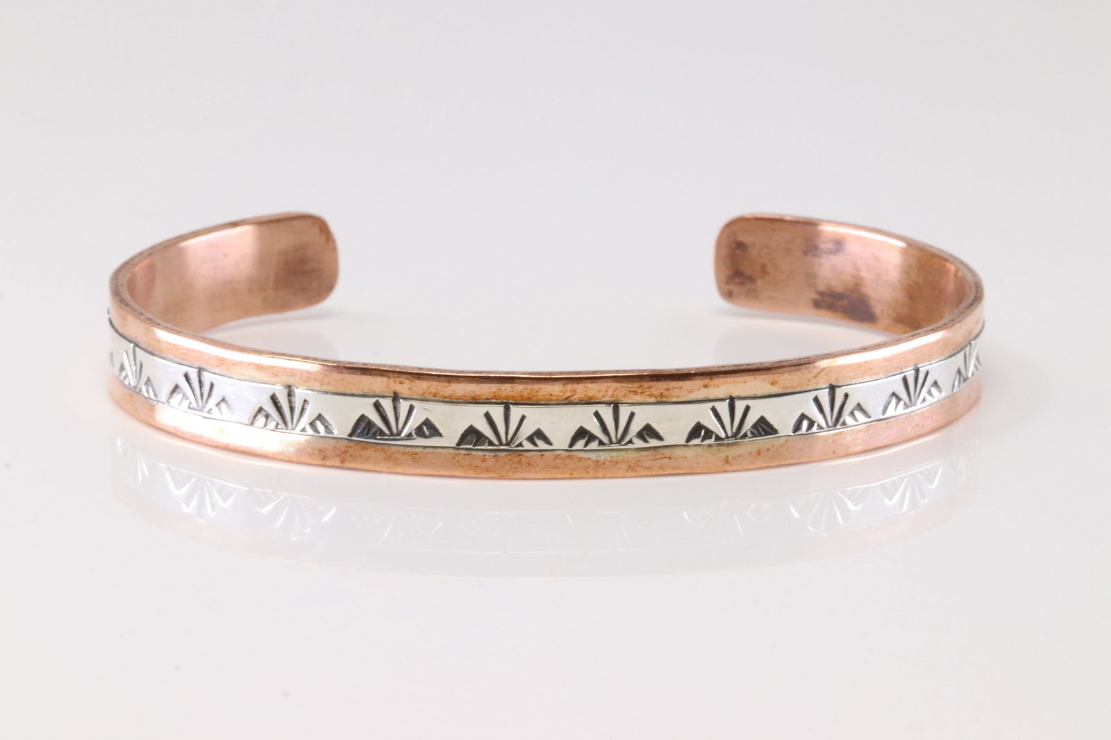 Native America Navajo Sterling Silver Copper Bracelet Cuff By J.G.: This is a Native America Navajo Sterling Silver Copper Bracelet Cuff By J.G.
