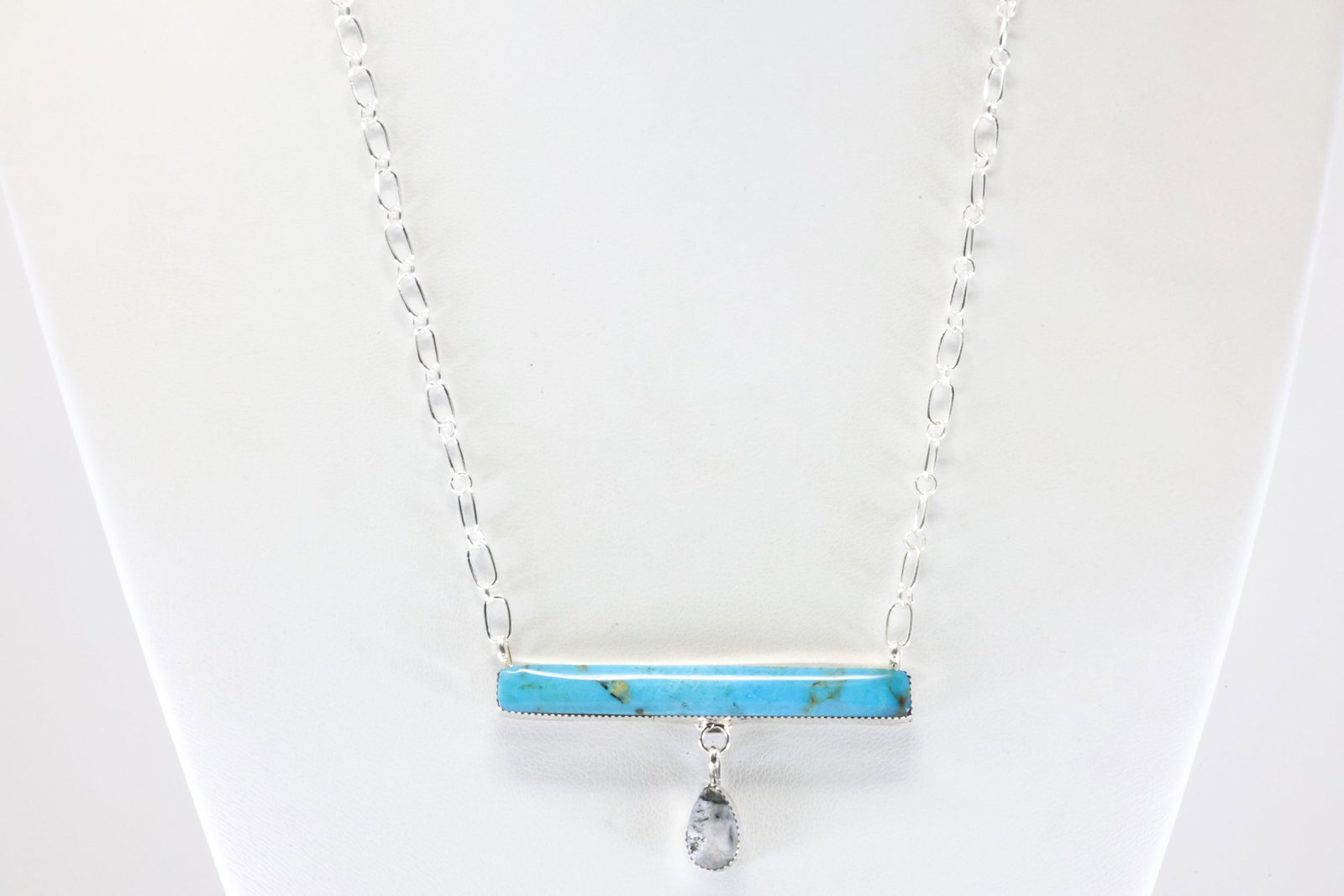 Native America Navajo Sterling Silver White Buffalo / Turquoise Necklace By Sheena Jack. From R. B: This is a Native America Navajo Sterling Silver White Buffalo / Turquoise Necklace By Sheena Jack. From R.B Company. Stamp R.B. Necklace Length: 18.00"