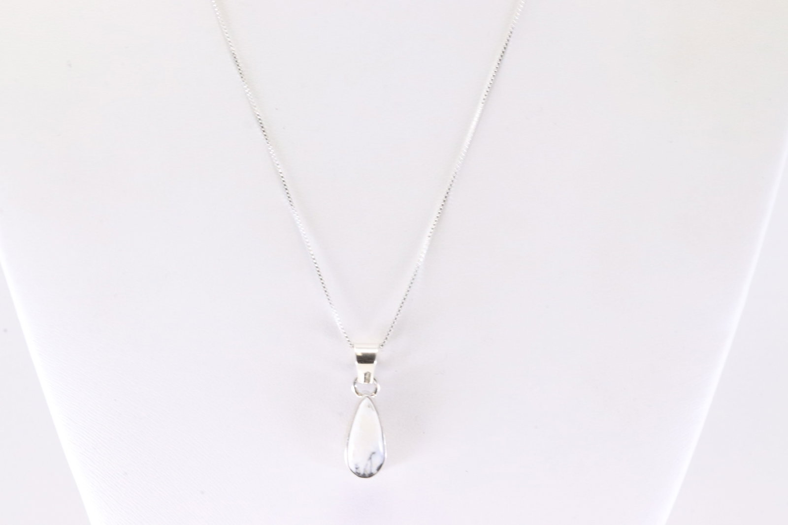 Native America Navajo Sterling Silver White Buffalo Pendant By T.F. with A 925 Necklace.: This is a Native America Navajo Sterling Silver White Buffalo Pendant By T.F. with A 925 Necklace. Necklace length: 18.00"