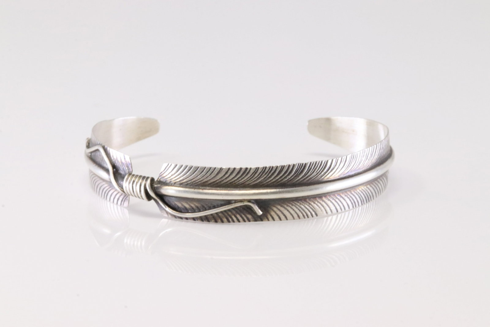 Native America Navajo Sterling Silver Feather Bracelet Cuff By C.C.: This is a Native America Navajo Sterling Silver Feather Bracelet Cuff By C.C.
