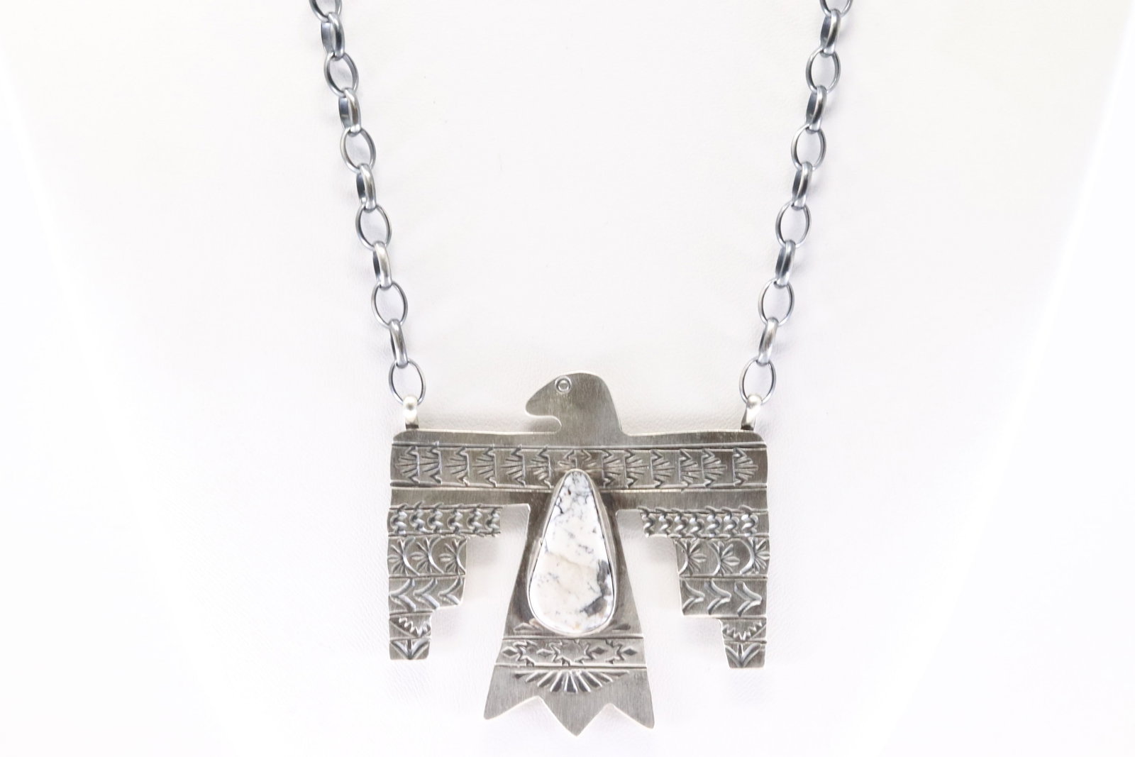 Native America Navajo Sterling Silver White Buffalo Thunderbird Necklace By Rick Enriquez.: This is a Native America Navajo Sterling Silver White Buffalo Thunderbird Necklace By Rick Enriquez. Stamp R.E. Necklace length: 18.00"