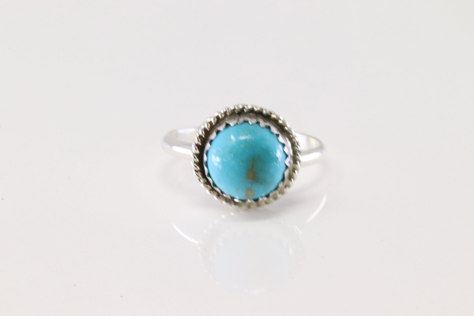 America Navajo Sterling Silver Turquoise Ring.: This is a America Navajo Sterling Silver Turquoise Ring. Ring Size: 5.00.