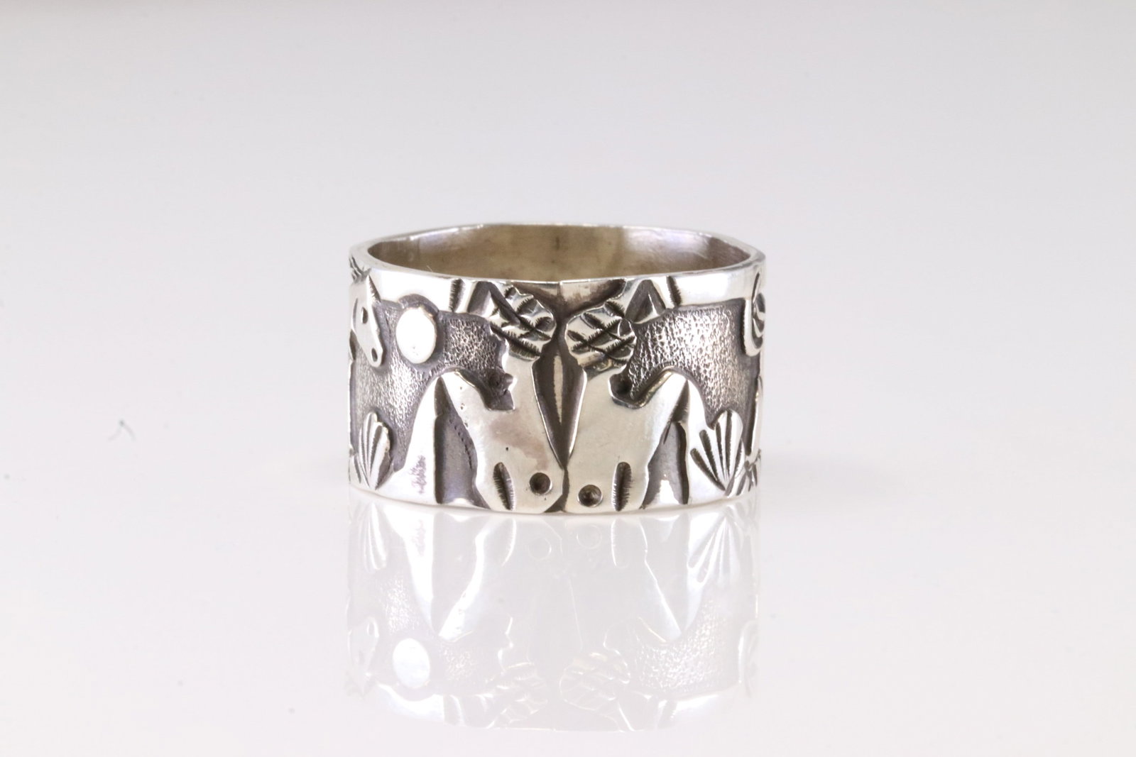 Native America Navajo Sterling Silver Horse Storyteller Ring By Lloyd Becenti.: This is a Native America Navajo Sterling Silver Horse Storyteller Ring By Lloyd Becenti. Ring Size: 12.00.