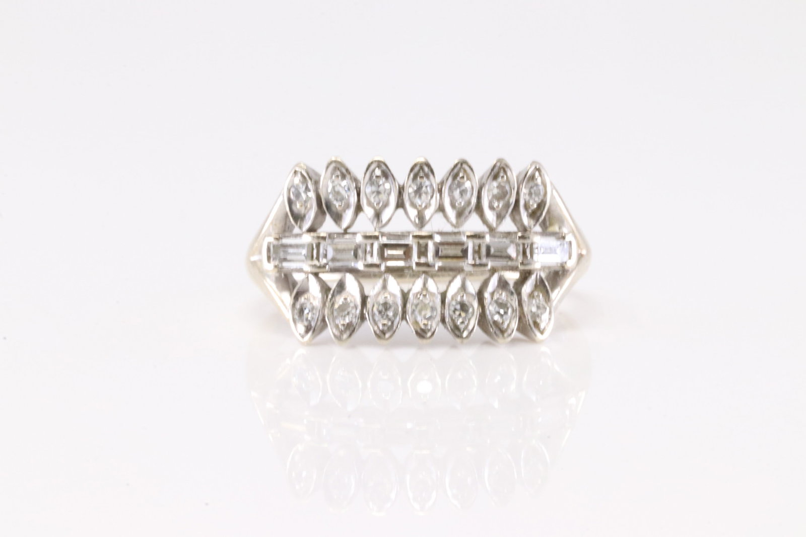 Diamond Ring 14Kt.: Ladies 14Kt White Gold Diamodn Ring. This Chraming Ring has Baguette & Round Diamonds. Diamonds weight approx:0.50 ctw Ring size: 7.25. Total weight: 5.52 Grams.
