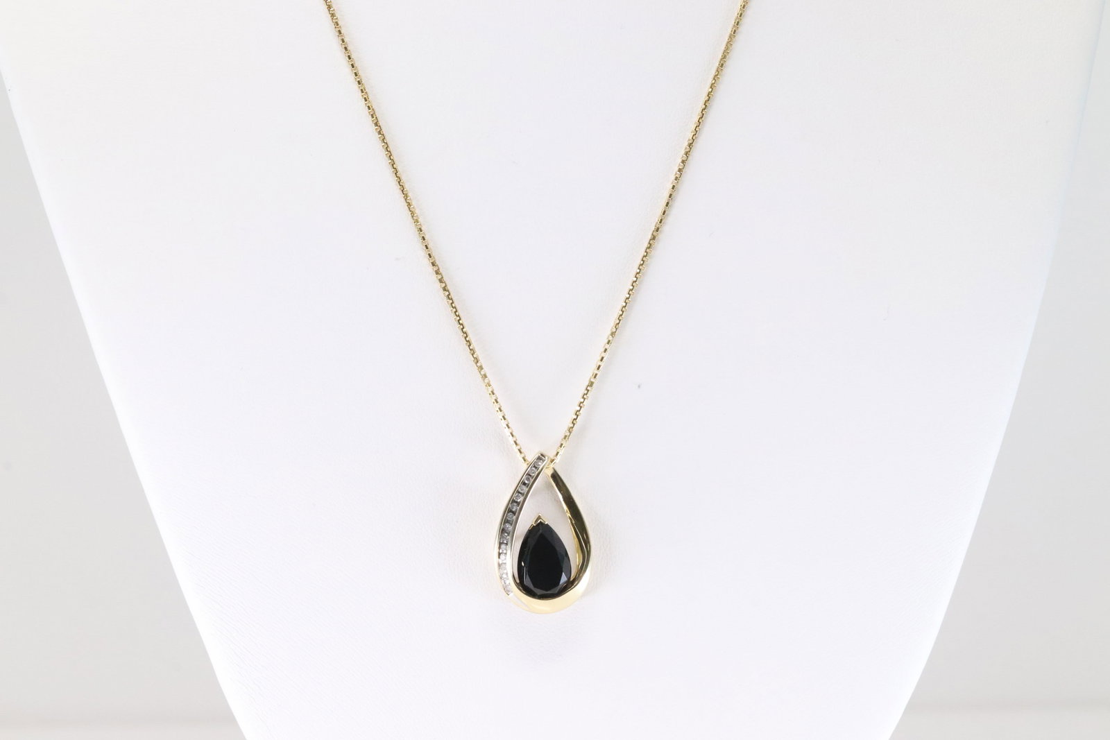 Sapphire & Diamond Pendant / Necklace 14Kt.: Ladies 14Kt Yellow Gold Sapphire & Diamond Pendant / Necklace. This Charming Pendant has Pear-Shaped Sapphire with 14 Sparkling Diamonds, Necklace length: 18.00" Total weight: 6.40 Grams.