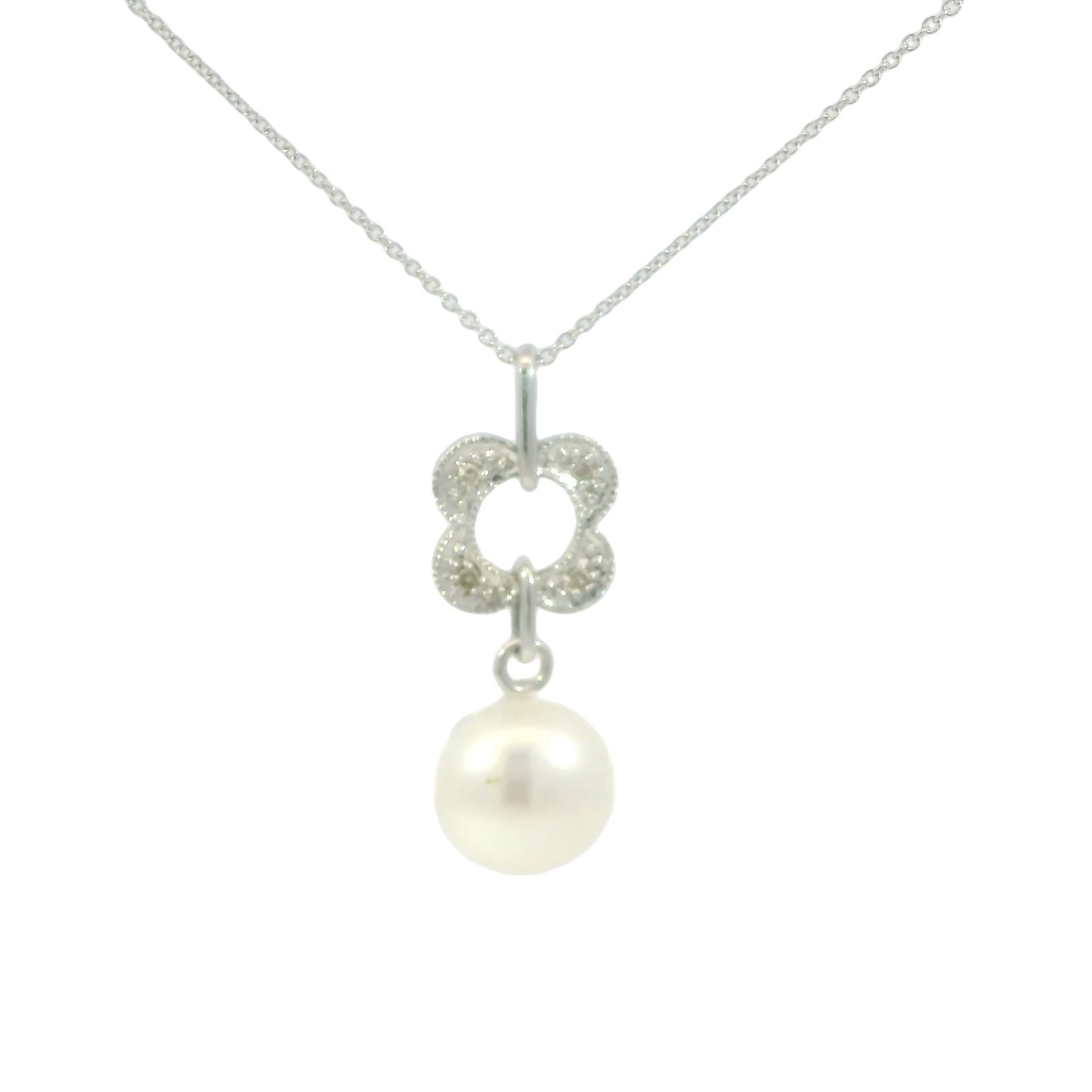 14Kt Pearl Diamond Pendant.: A Ladies 14Kt White Gold Pearl Diamond Pendant. This stunning necklace features a delicate silver chain adorned with an exquisite pearl pendant. The centerpiece is complemented by a sparkling,