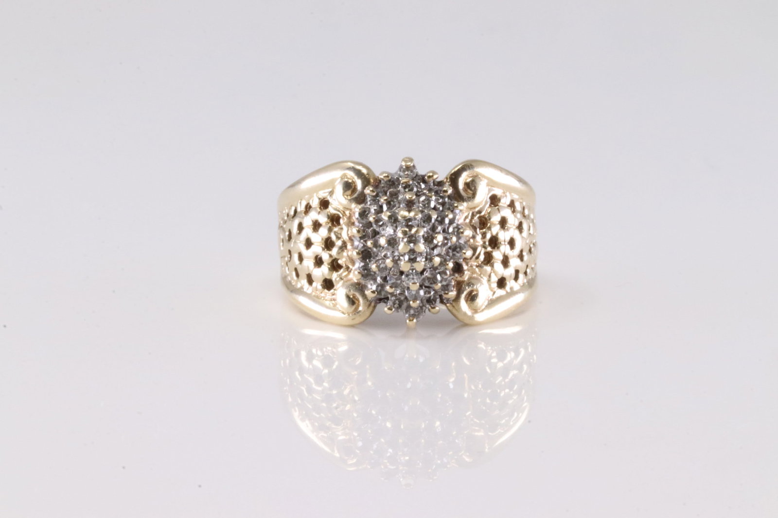 Elegant Diamond Ring 10Kt.: Ladies 10Kt Yellow Gold Diamond Ring. This Elegant Ring has Cocktail Diamonds. Ring size: 8.75. Total weight: 8.88 Grams.