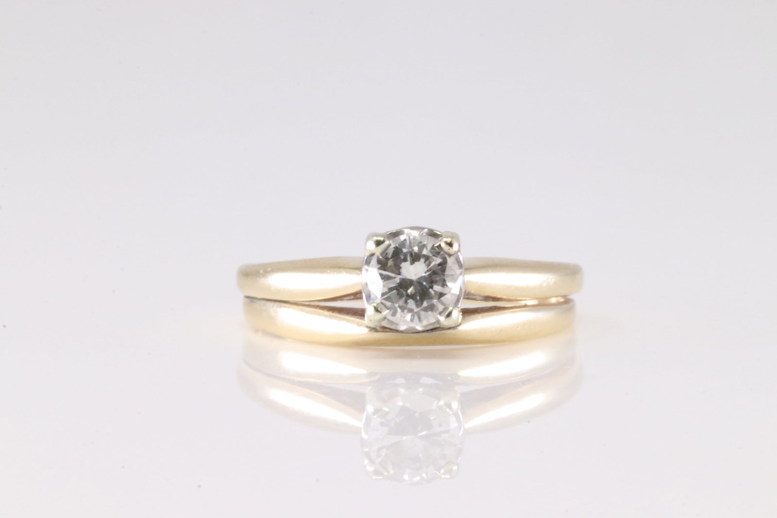 Diamond Ring 14Kt.: Ladies 14Kt Yellow Gold Diamond Ring. This Charming Ring has Double Band with Solitaire Sparkling Diamond. Diamond weight approx: 0.40 ctw Ring size: 8.25. Total weight: 3.57 Grams.