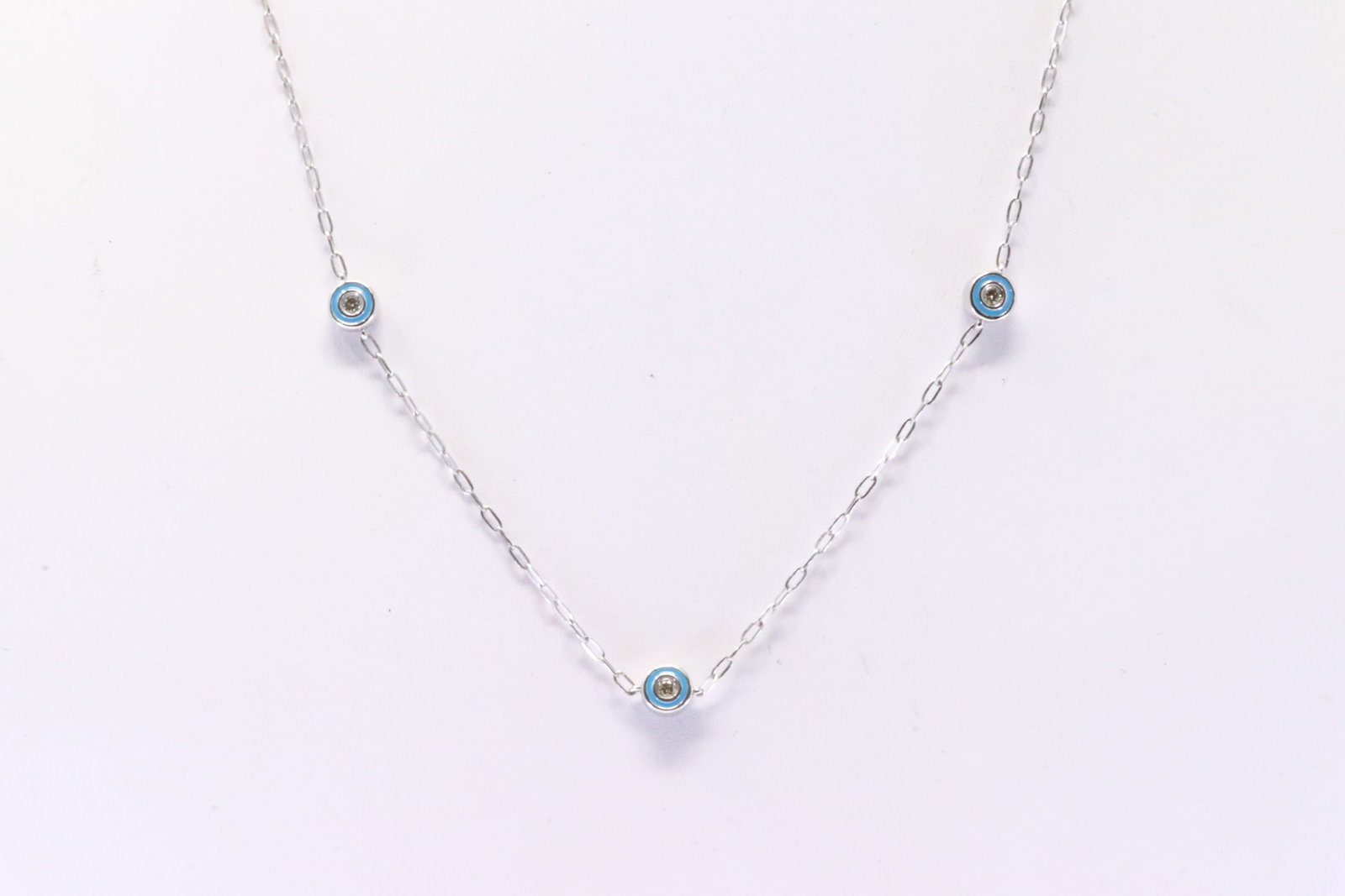 Enamel & Diamond Necklace 10Kt.: 10Kt White Gold Enamel & Diamond Necklace. Necklace has Blue Enamel with round Diamonds. Diamonds weight: 0.35ctw. Necklace length: 16.00" Total weight: 3.80 Grams.