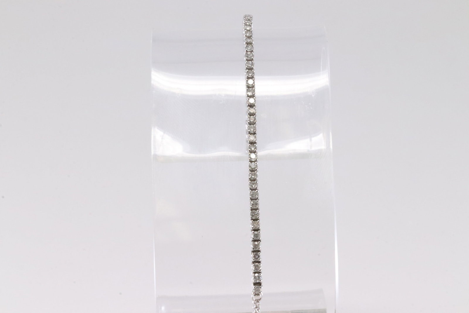 Bolo Diamond Bracelet 10Kt.: 10Kt White Gold Bolo Diamond Bracelet. This Elegant Bolo Bracelet has 50 Sparkling Diamonds. Diamonds weight Approx:0.50 ctw Total weight: 5.16 Grams.