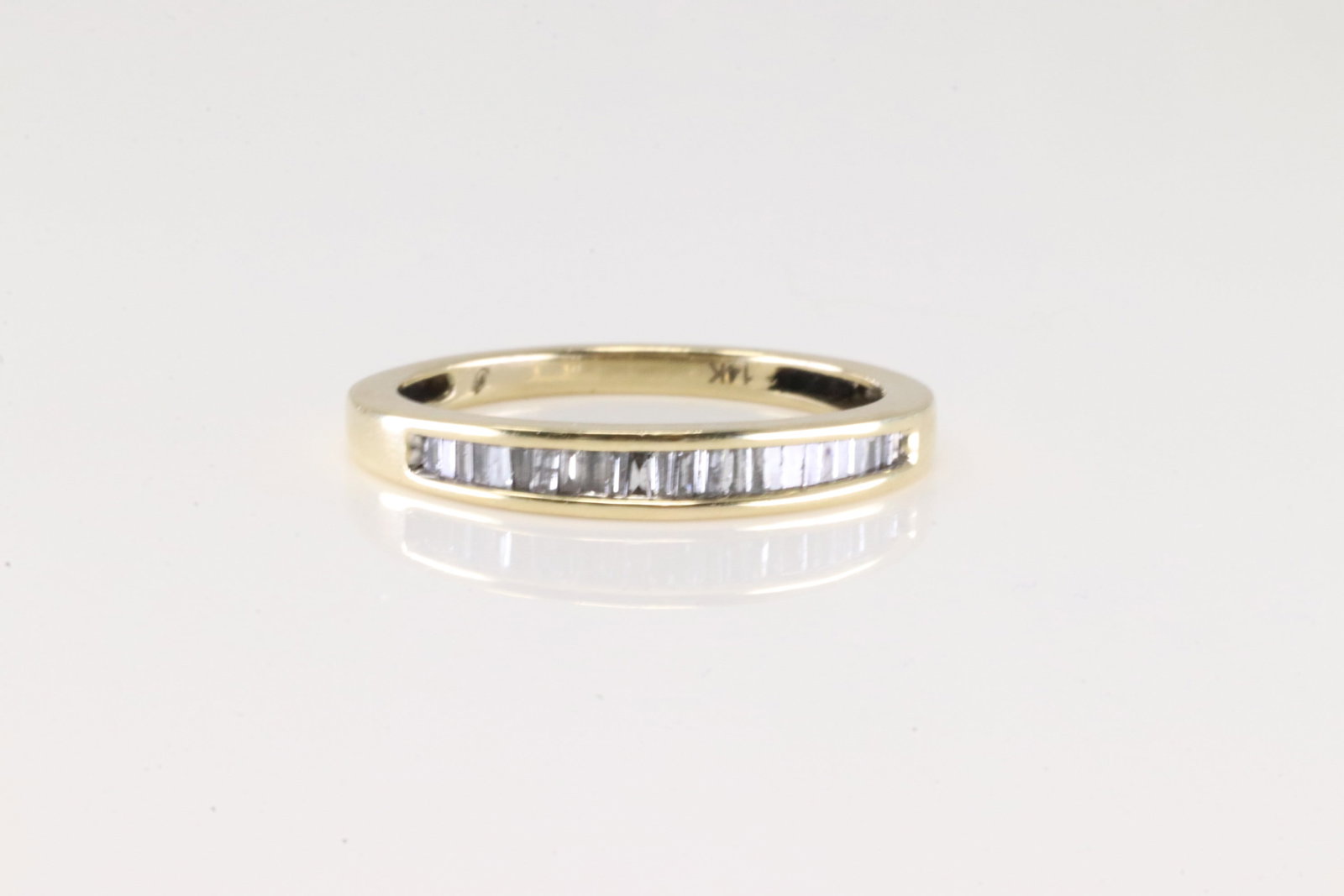 Baguette Diamond Ring 14Kt.: Ladies 14Kt Yellow Gold Baguette Diamond Ring. This Ring has Gorgeous Baguette Diamonds. Ring Size: 7.00. Total Weight: 2.20 Grams.