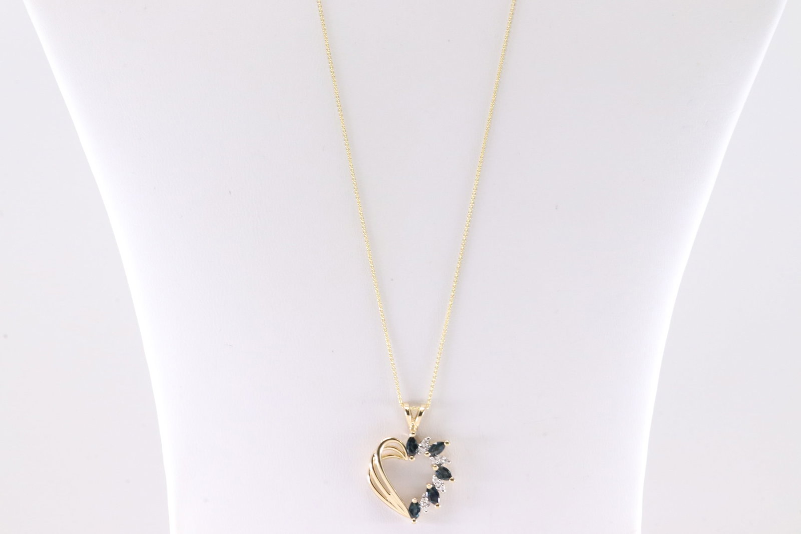 Sapphire & Diamond Heart Pendant / Necklace 14Kt.: 14Kt Yellow Gold Sapphire & Diamond Heart Pendant / Necklace. This Charming Heart Pendant has Marquise Sapphires with Sparkling Diamonds and A 14K Necklace. Necklace length: 22.00" Total weight: 4.00