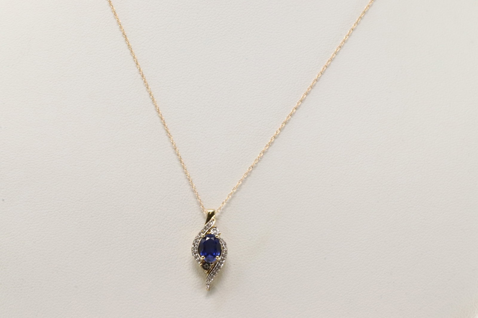 Sapphire & Diamodn Pendant / Necklace 10Kt.: Ladies 10Kt Yellow Gold Sapphire & Diamond Pendant / Necklace. This Necklace has a Pendant with Blue sapphire and Sparkling Diamonds. Diamonds weight: 0.07ctw. Necklace length: 18.00"