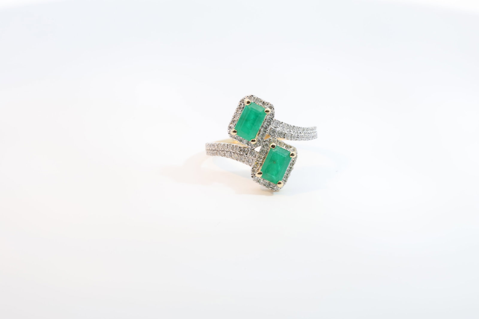 Emerald & Diamond Ring 14Kt.: Ladies 14Kt Yellow Gold Emerald & Diamond Ring. Ring has 2 Cut Emerald's Gems with 78 round Brlliants Diamonds. Diamonds weight: 0.43ct. Emerald's weight: 1.10ct. Ring size: 6.50. Total weight: 2.70