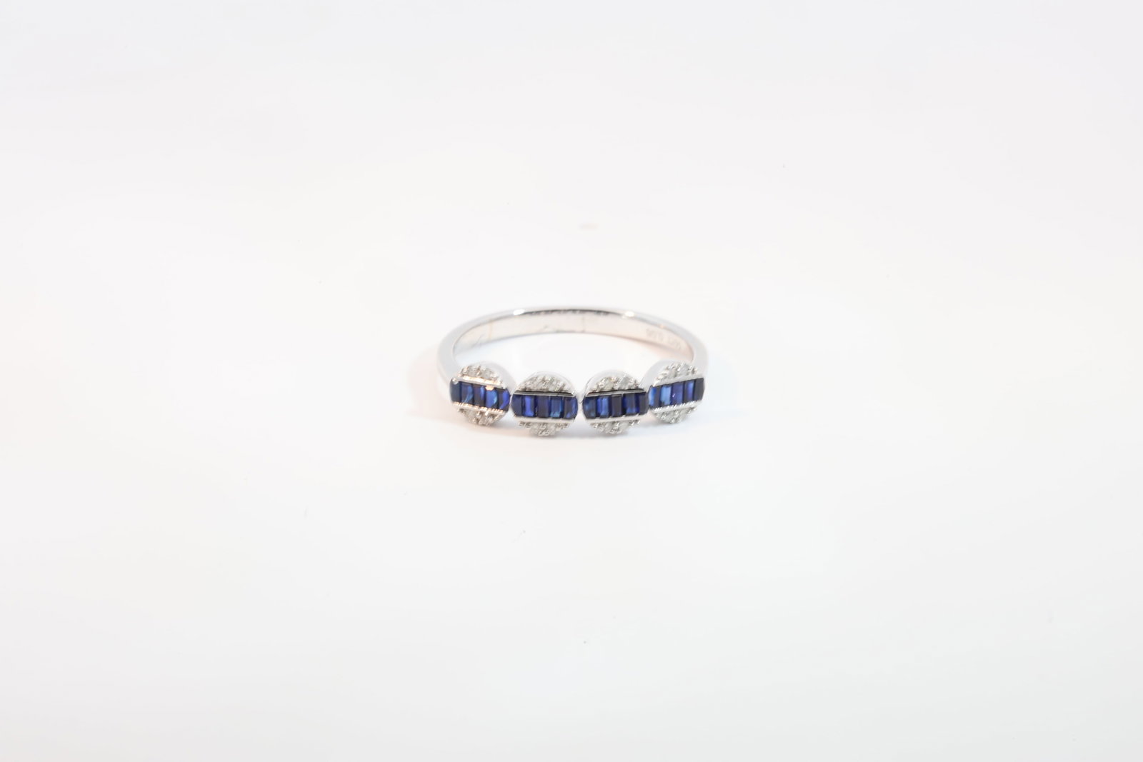 Sapphire & Diamond Ring 14Kt.: 14Kt White Gold Sapphire & Diamond Ring. Ring has Cut Sapphire's round Diamonds. Diamonds weight: 0.05ct. Sapphire's weight: 0.30ct. Ring size: 6.50.