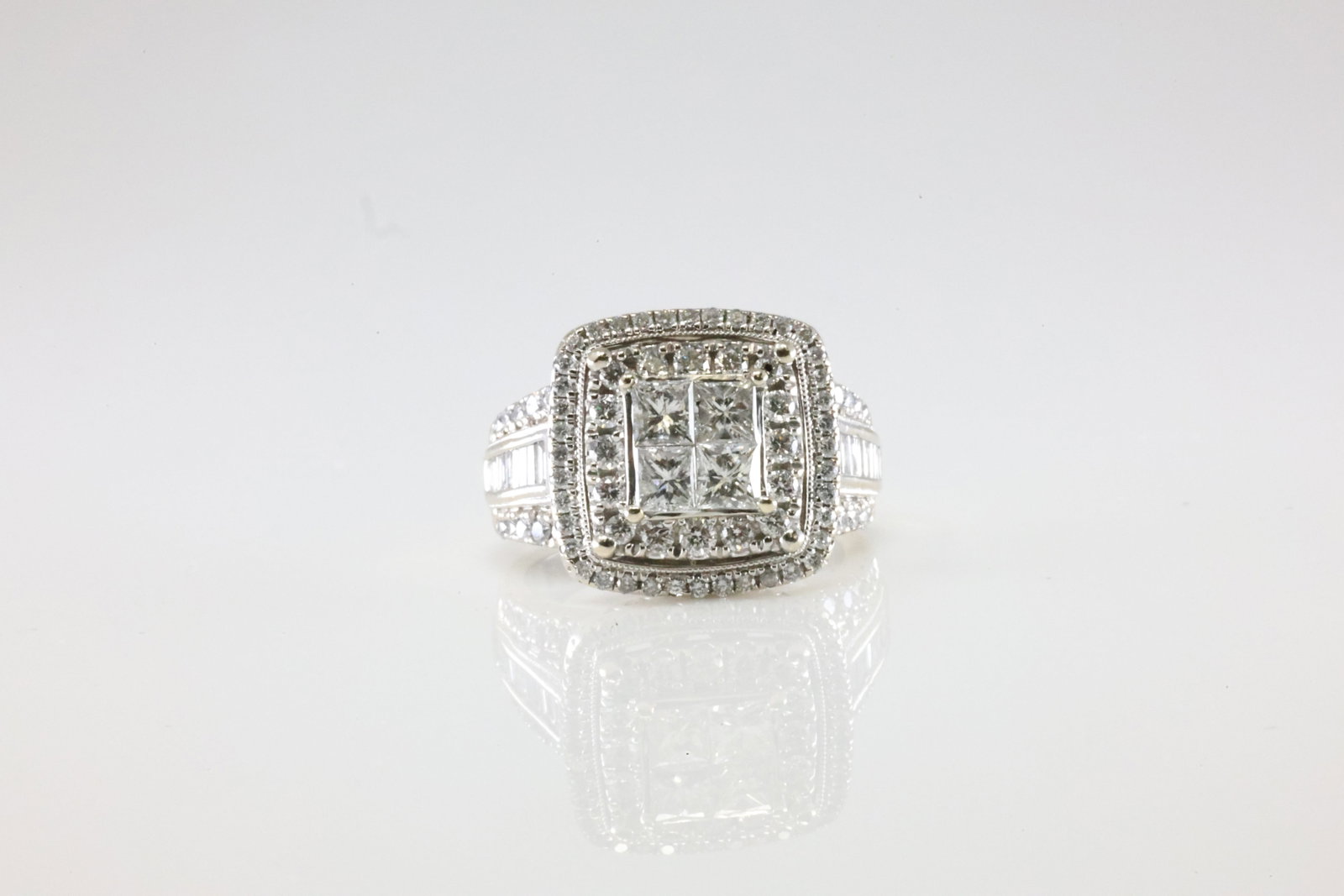 Diamond Ring 14Kt.: Ladies 14kt White Gold Diamond Ring. This Charming Ring has 80 Round / 20 Baguette Diamonds. Diamond Weight Approx: 2.50ctw. Ring Size: 8.50. Total Weight: 11.46 Grams.