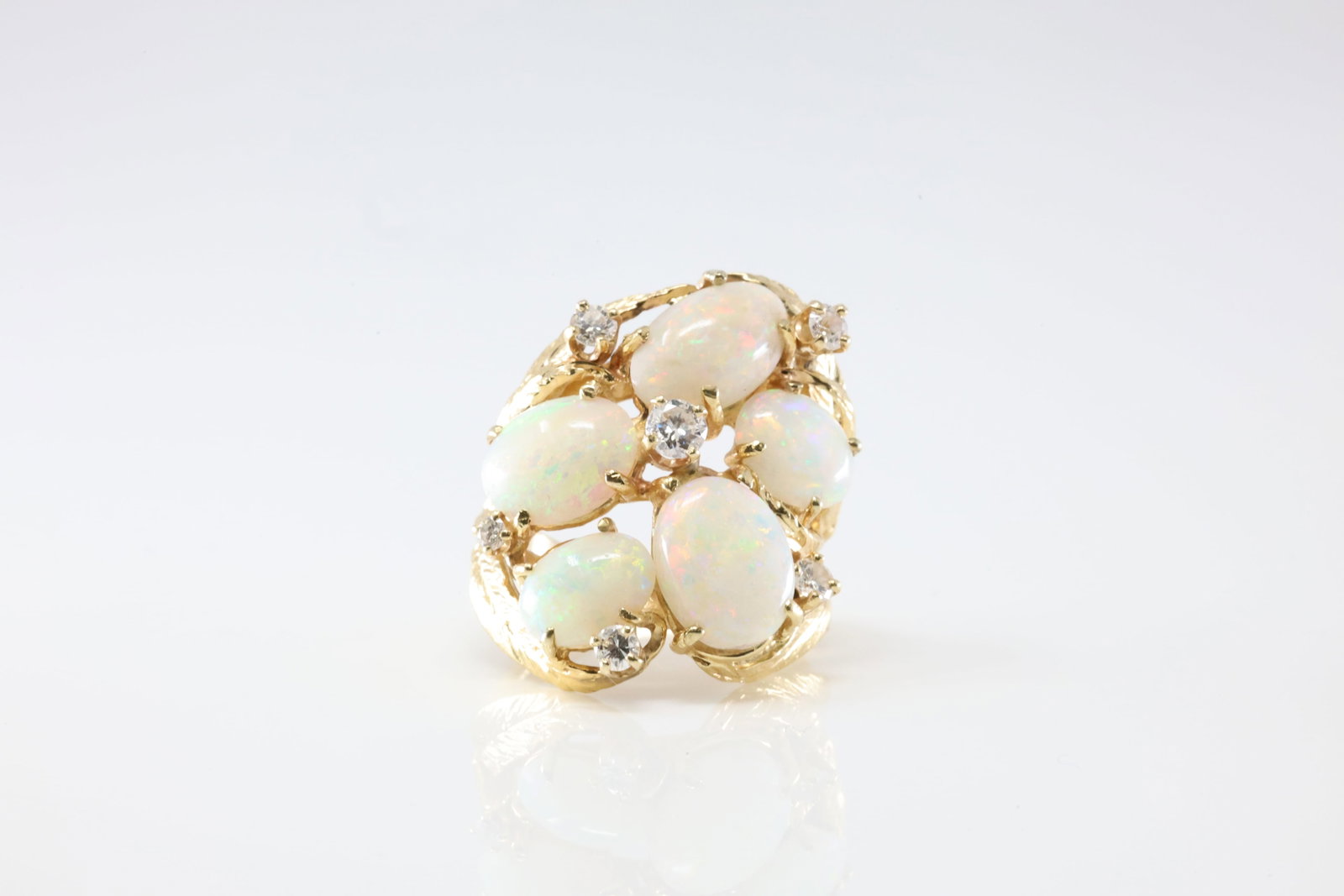 Opal & Diamond Ring 14Kt.: Ladies 14Kt Yellow Gold Opal & Diamond Ring. This Charming Ring has 5 Opal Gemstones & 6 Round Sparkling Diamonds. Diamond Weight Approx: 0.35 ctw Ring Size: 6.75. Total Weight: 10.49 Grams.