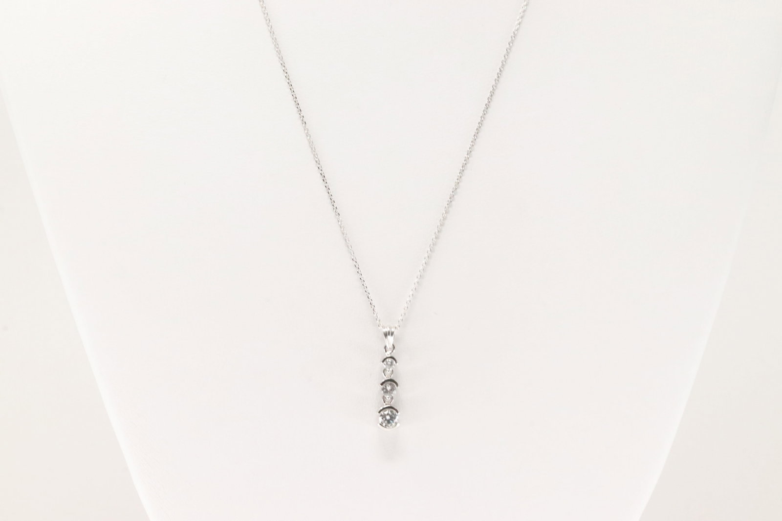 Diamond Pendent / Necklace 14Kt.: Ladies 14Kt White Gold Diamond Pendent / Necklace. This Pendent has 3 Brilliant Round Diamonds With A 14K White Necklace. Necklace Length: 18.00. Total weight: 2.50 Grams.
