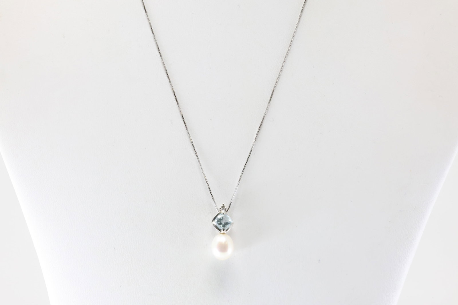 Aquamarine, Peral & Diamond Pendent / Necklace 14Kt.: Ladies 14Kt White Gold Aquamarine, Pearl & Diamond Pendent / Necklace. This Necklace has A Pendent With Pearl, Aquamarine Gemstone & Solitaire Diamond. Necklace Length: 18.00. Total Weight: 2.55