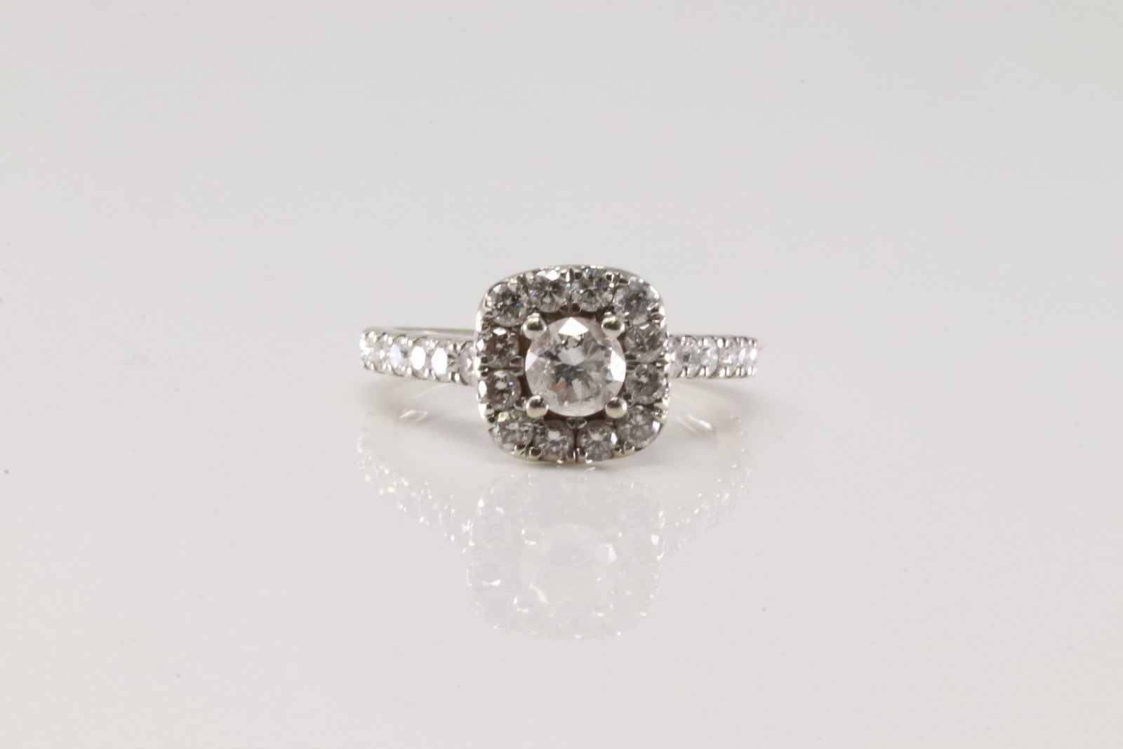 Engagement Diamond Ring 14Kt.: Ladies 14Kt White Gold Engagement Diamond Ring. This Elegant Ring has 43 Sparkling round Diamonds. Diamonds weight approx: 1.50 ctw Ring size: 5.50. Total weight: 3.10 Grams.