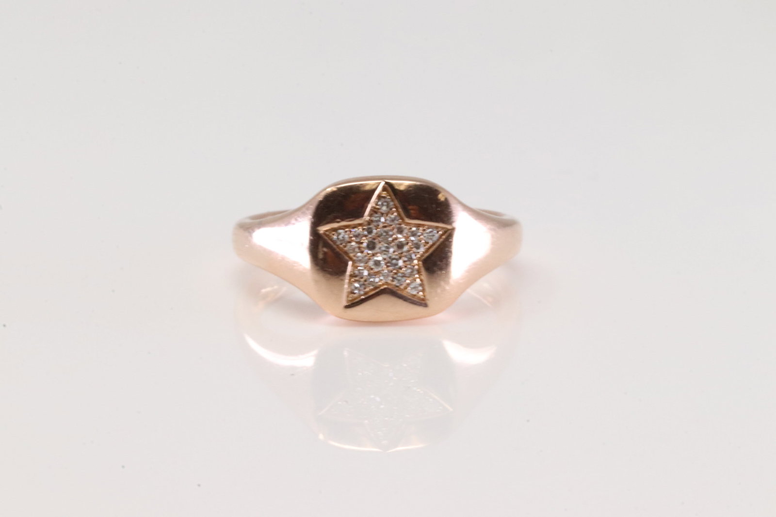Diamond Ring 14Kt.: Ladies 14Kt Rose Gold Diamond Ring. This Ring has Star Design With 26 Round Sparkling Diamonds. Ring Size: 3.75. Total Weight: 2.76 Grams.