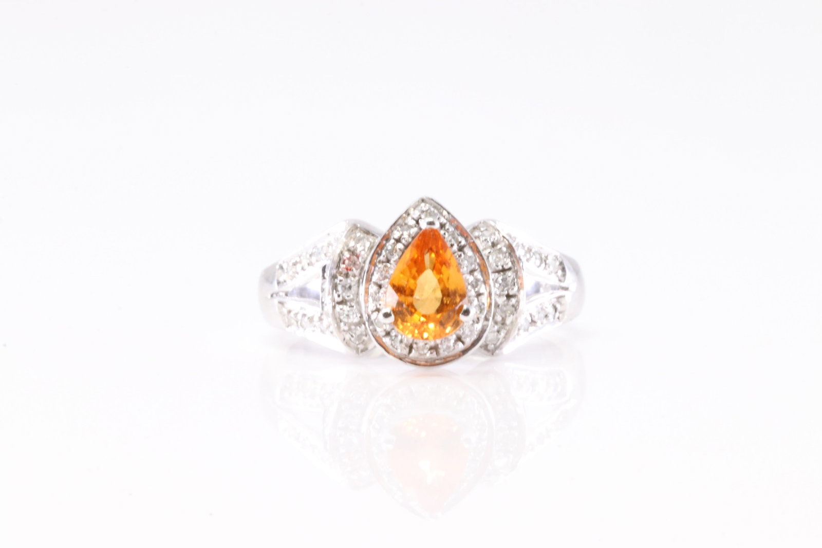 Elegant Citrine & Diamond Ring 14Kt.: Ladies 14Kt White Gold Citrine & Diamond Ring. This Elegant Ring has Pear-Shape Citrine with Brilliants Diamonds. Diamonds weight: 0.23ctw. Ring size: 7.00. Total weight: 4.65 Grams.