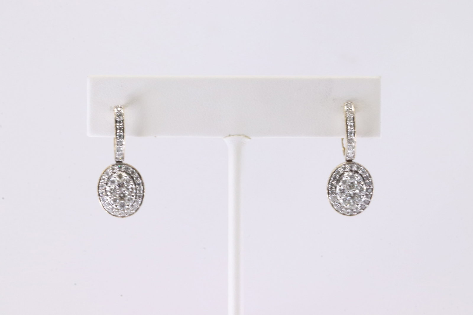 Diamond Hoop Earring 10Kt.: 10Kt Yellow Gold Diamond Hoop. This Charming Hoop Earring's has Brilliants Diamonds. Diamonds weight approx: 0.55ctw. Total weight: 4.31 Grams.