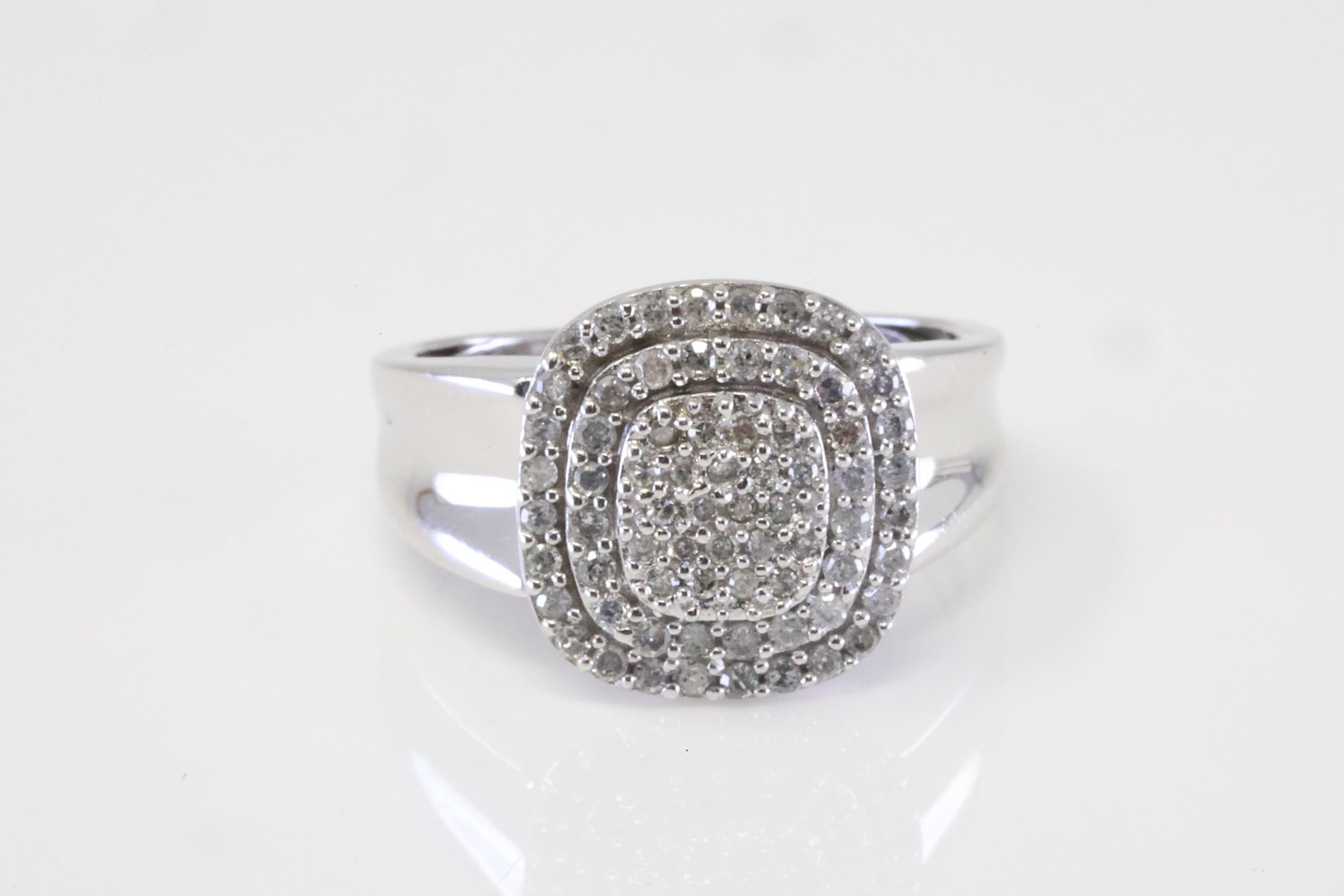 Wedding Diamond Ring 10Kt.: Ladies 10Kt White Gold Wedding Diamond Ring. Ring has round Diamonds.: Ring size: 7.00. Total weight: 4.40 Grams.