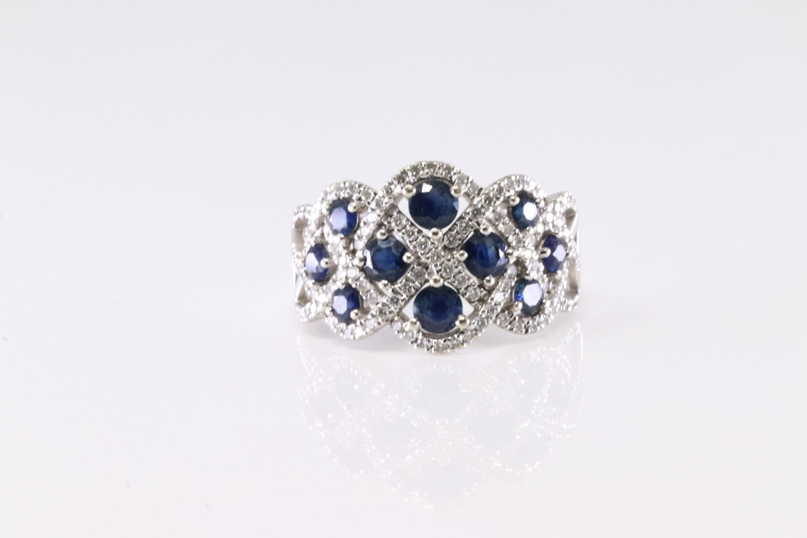 Sapphire & Diamond Ring 14Kt.: Ladies 14Kt White Gold Sapphire & Diamond Ring. This Elegant Ring has Blue Sapphire Gemstones With Round Sparkling Diamonds. Ring Size: 7.00. Total Weight: 5. 66 Grams.