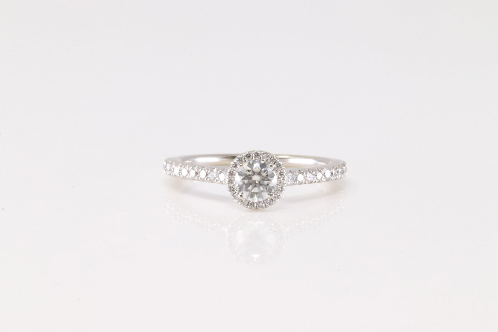 Elegant Engagement Diamond Ring 14Kt.: Ladies 14Kt White Gold Engagement Ring. This Elegant Engagement Ring has 39 round Brilliants Diamonds. Middle Diamond Measure: 4.8x4.8mm. Diamonds weight approx: 0.70 ctw Ring size: 7.00. Total