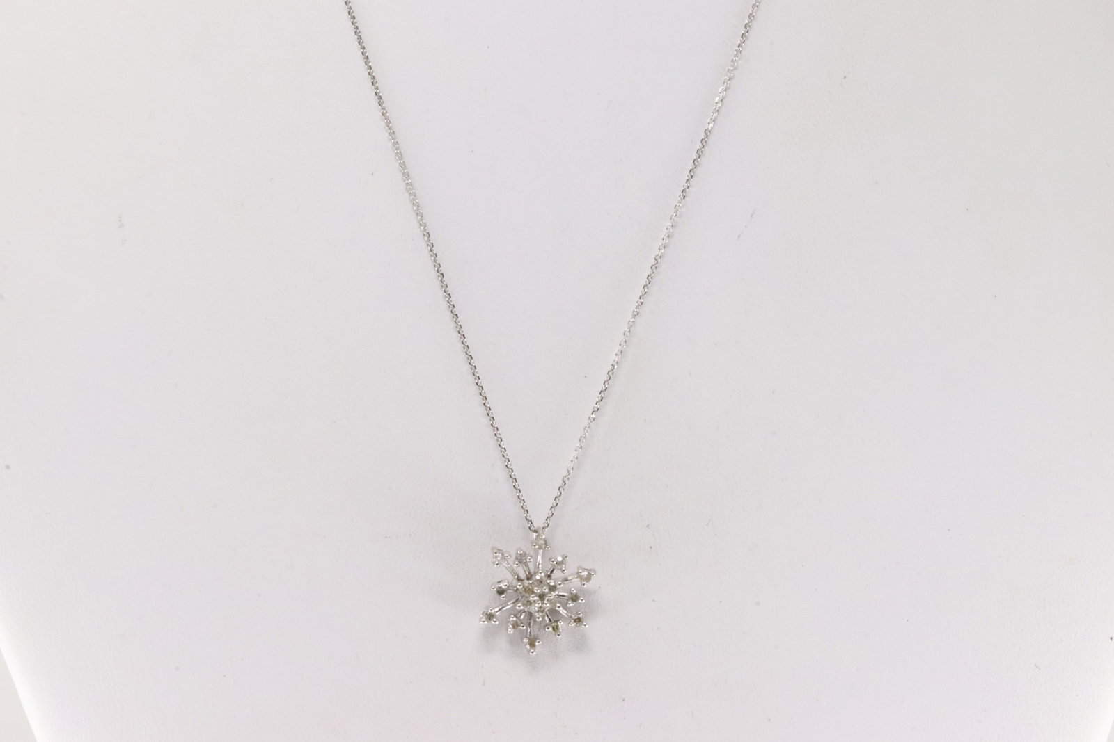 Diamond Pendant / Necklace 10Kt.: 10Kt White Gold Diamond Pendant / Necklace. This pendant has 19 round diamonds with a 14k necklace. Diamonds weight approx: 0.50ctw. Necklace length: 16.00" Total weight: 2.50 Grams.