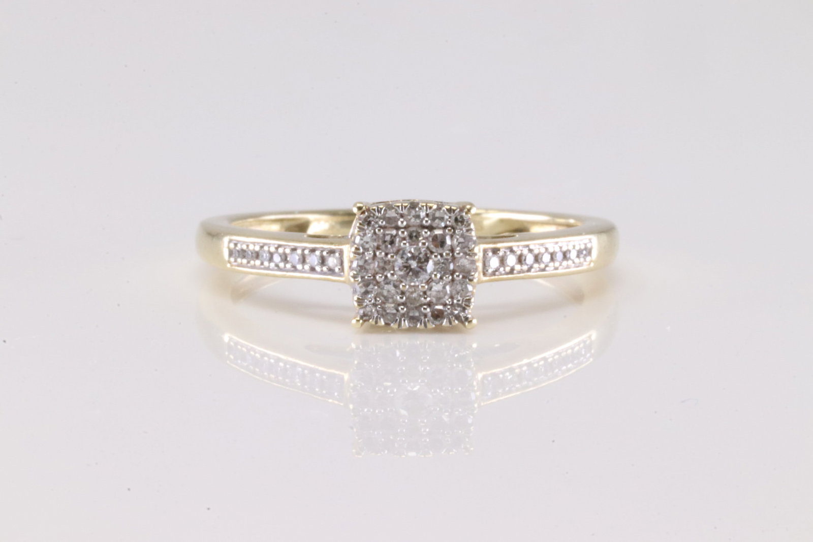 Diamond Ring 10Kt.: Ladies 10Kt Yellow Gold Diamond Ring. This Elegant wedding Ring has Sparkling Diamonds. Ring size: 6.75.