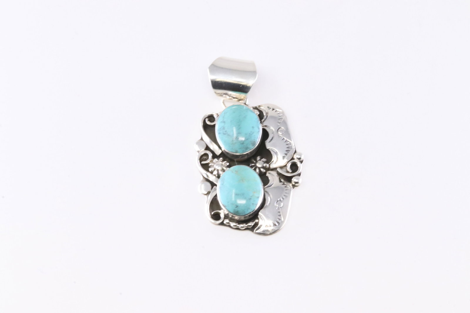 Native America Navajo Sterling Silver Turquoise Pendant By Jeremy Delgarito.: This is a Native America Navajo Sterling Silver Turquoise Pendant By Jeremy Delgarito.