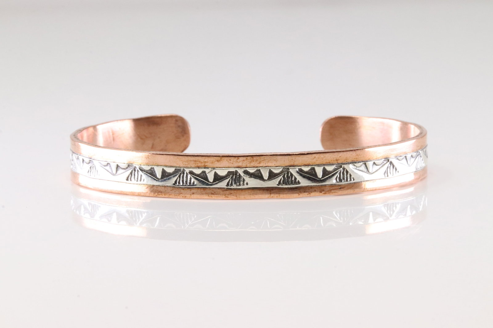 Native America Navajo Sterling Silver Copper Bracelet Cuff By J.G.: This is a Native America Navajo Sterling Silver Copper Bracelet Cuff By J.G.