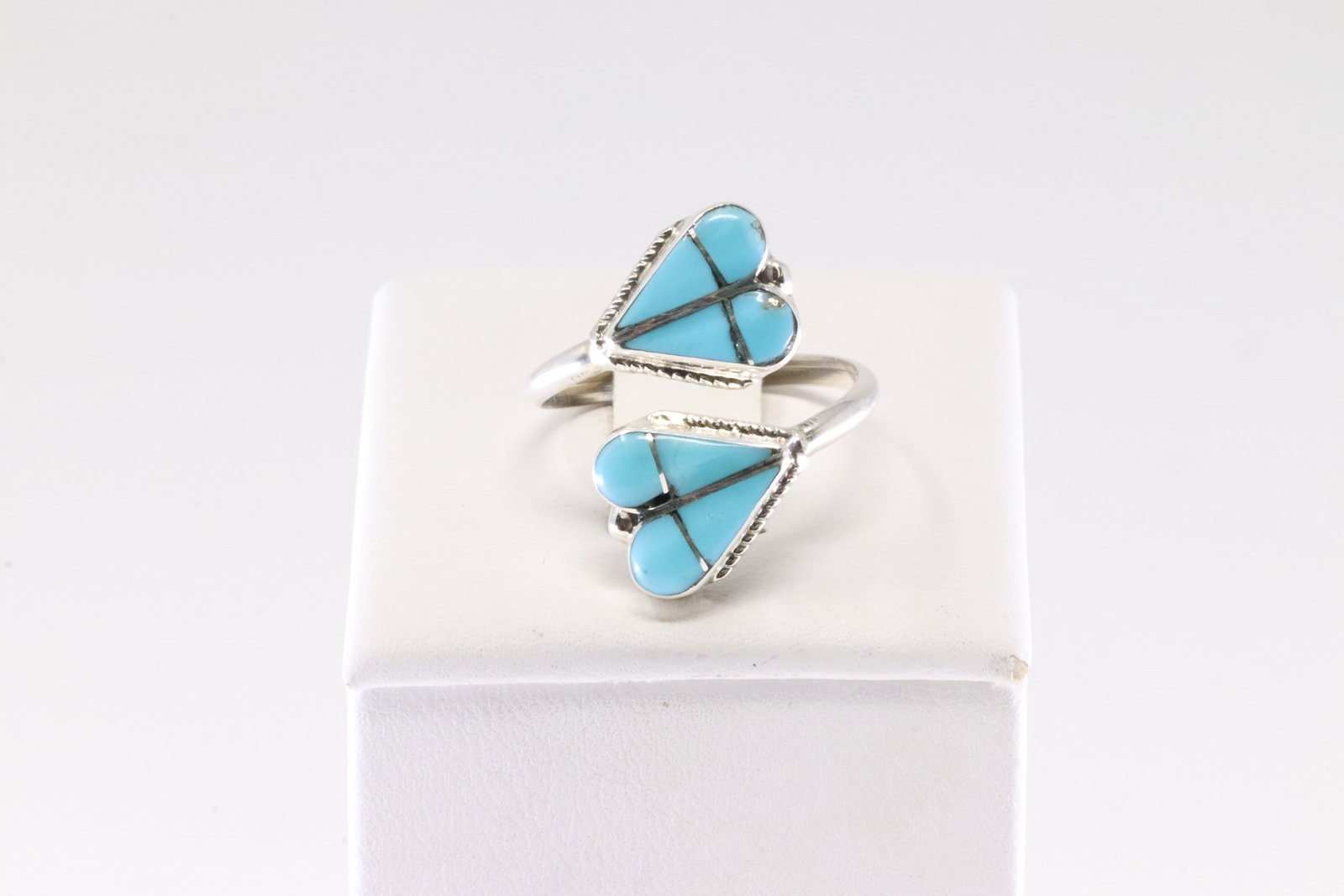 Native America Zuni Sterling Silver Turquoise Inlay Ring By R.V.N.: This is a Native America Zuni Sterling Silver Turquoise Inlay Ring By R.V.N. Ring size: 7.00.