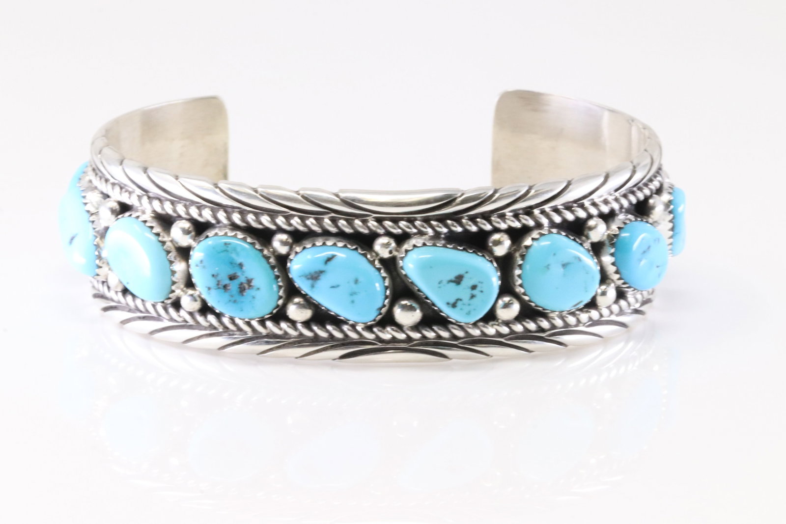Native American Navajo Sterling Silver Kingman Turquoise Bracelet Cuff By Calvin James.: This is a Native American Navajo Sterling Silver Kingman Turquoise Bracelet Cuff By Calvin James.
