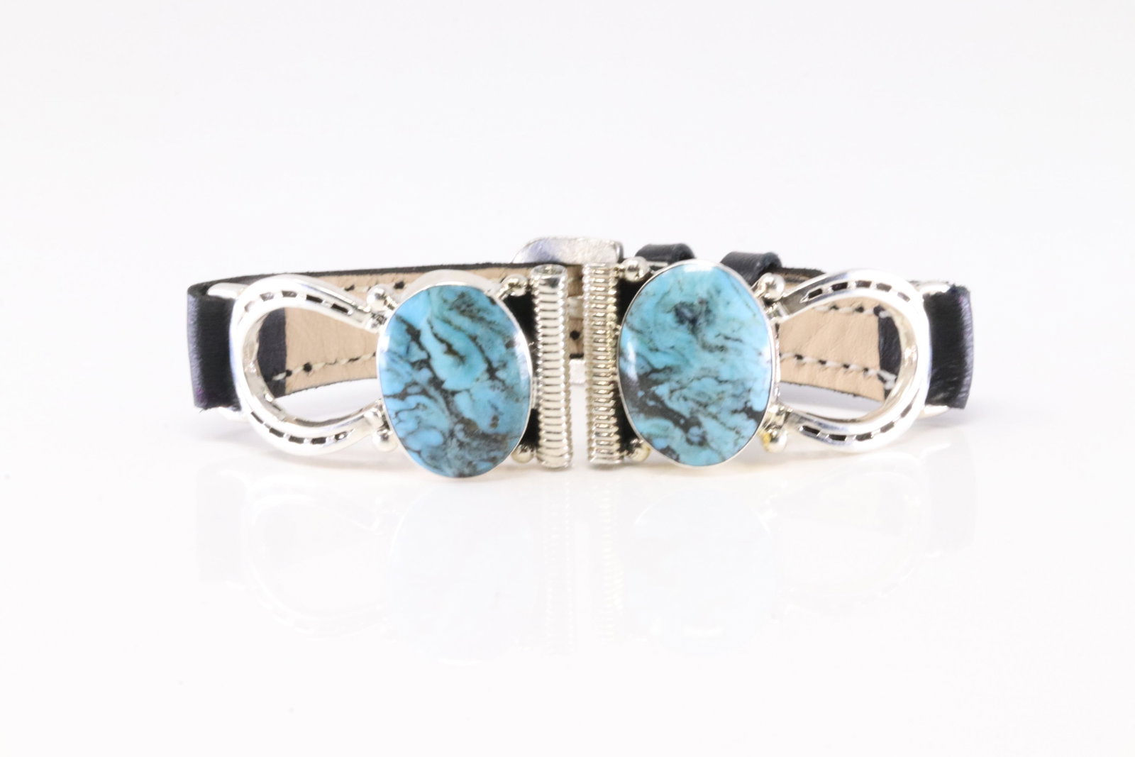 Native America Navajo Sterling Silver Turquoise Leather Watch Band By Leroy Silversmith.: This is a Native America Navajo Sterling Silver Turquoise Leather Watch Band By Leroy Silversmith. From R.B Company. Bracelet Length: 6.00.