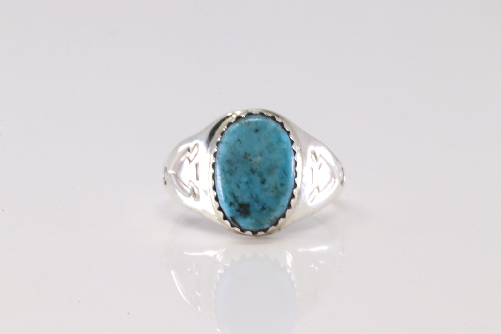Native America Navajo Sterling Silver Turquoise Ring By ML.: This is a Native America Navajo Sterling Silver Turquoise Ring By ML. Stamp ML. Ring Size: 8.50.