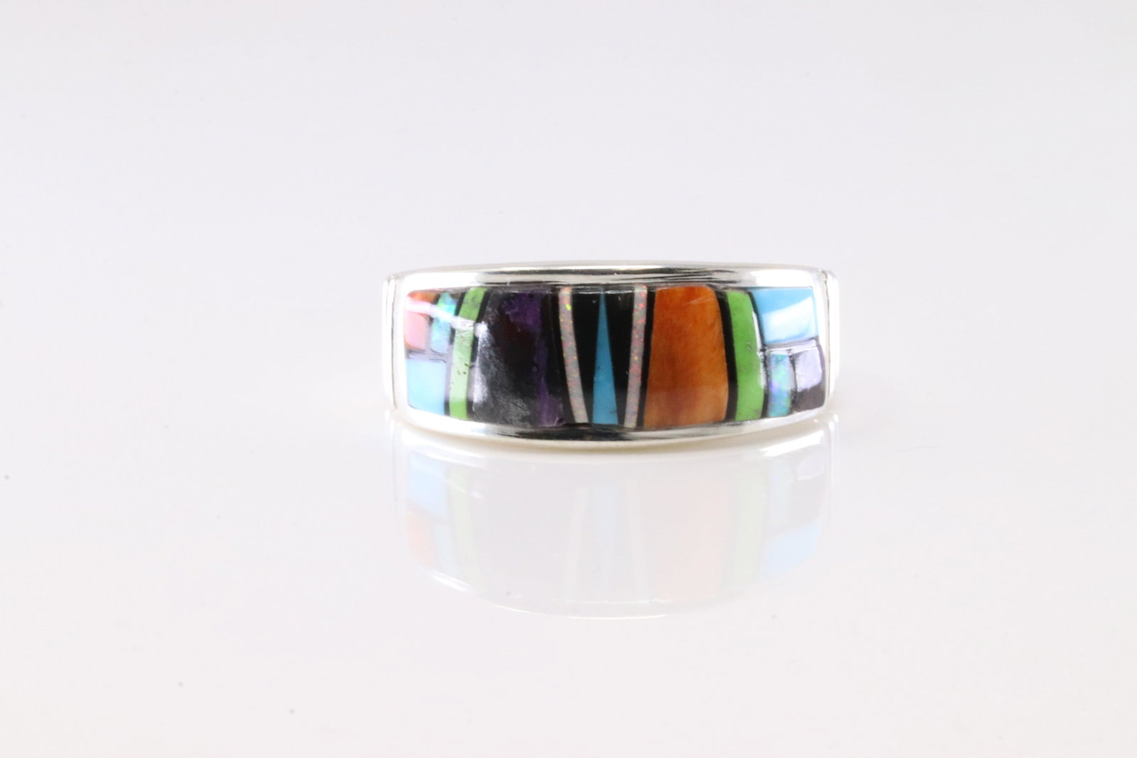 Native America Navajo Sterling Silver Multi-Color Stone Inlay Ring By Rick Tolino.: This is a Native America Navajo Sterling Silver Multi-Color Stone Inlay Ring By Rick Tolino. Stamp Rick T. Ring Size: 9.00.