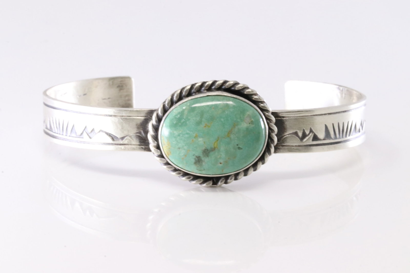 Native America Navajo Sterling Silver Kingman Turquoise Bracelet Cuff By Rick Enriquez.: This is a Native America Navajo Sterling Silver Kingman Turquoise Bracelet Cuff By Rick Enriquez. Stamp RE.