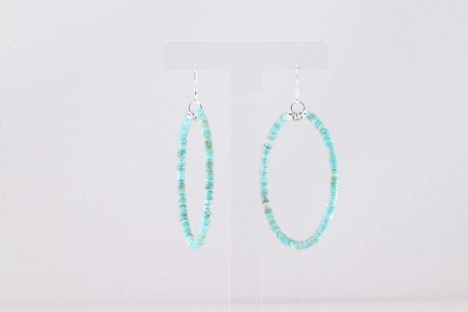 America Sterling Silver Turquoise Hoop Dangling Earring's.: This is a America Sterling Silver Turquoise Hoop Dangling Earring's.