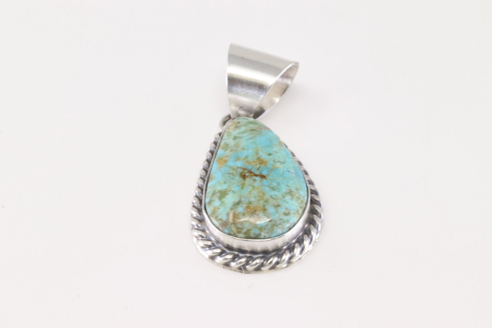 Native America Navajo Sterling Silver Turquoise Pendant By S.E.: This is a Native America Navajo Sterling Silver Turquoise Pendant By S.E.