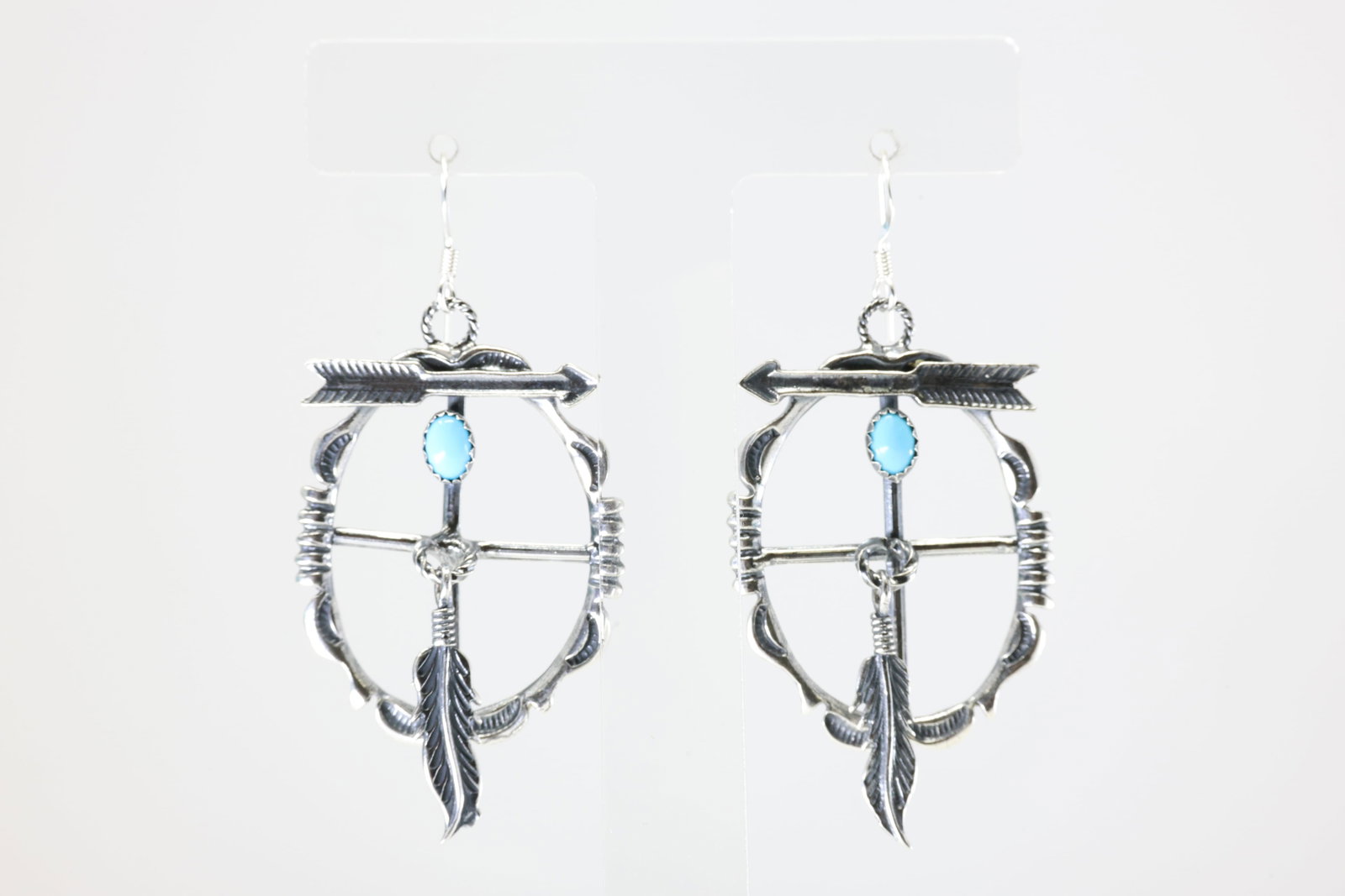 America Sterling Silver Turquoise Feather / Arrow Dangling Earring's.: This is a America Sterling Silver Turquoise Feather / Arrow Dangling Earring's.