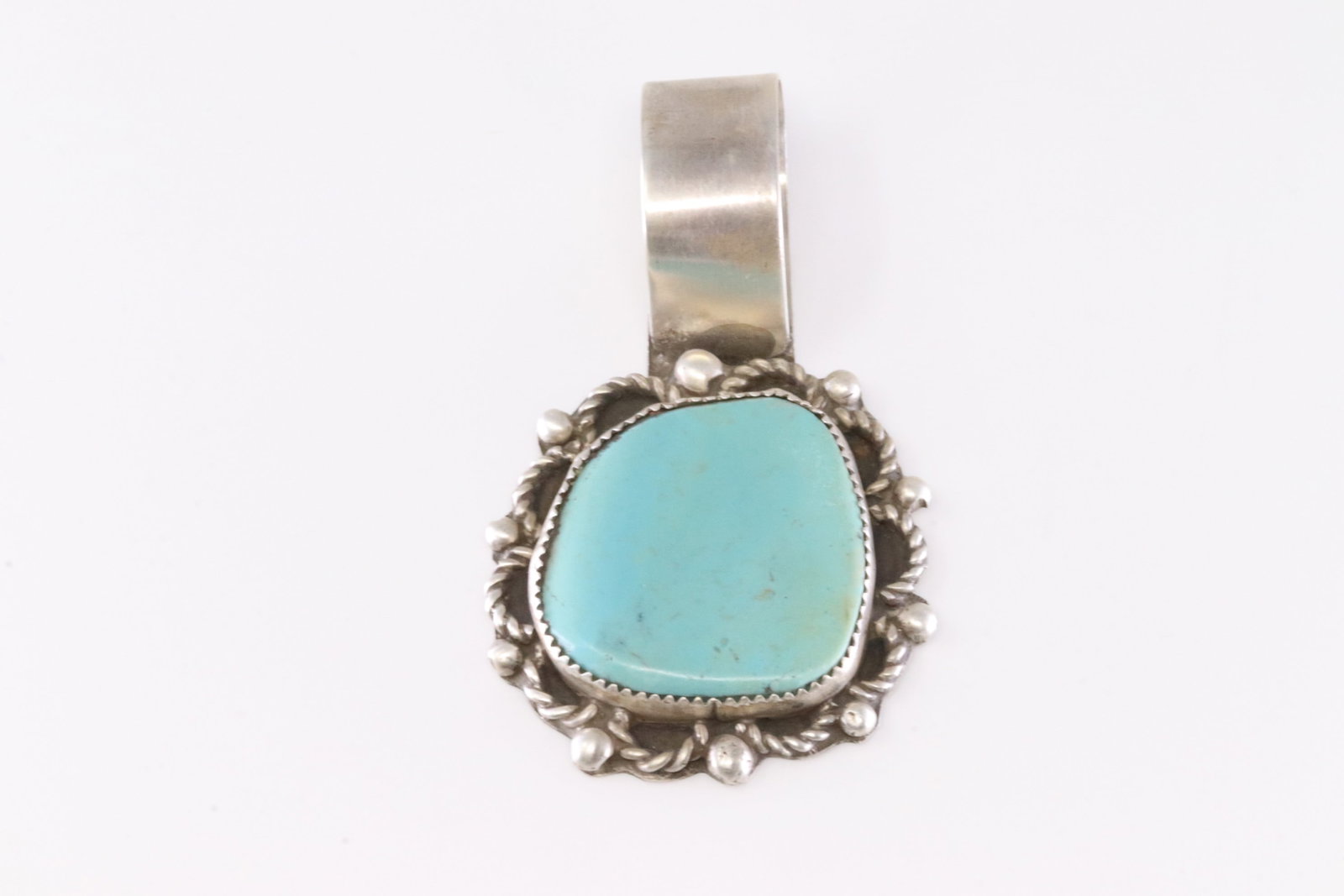 Native America Navajo Sterling Silver Turquoise Pendant By Virgnia Hino.: This is a Native America Navajo Sterling Silver Turquoise Pendant By Virgnia Hino. Stamp VH.
